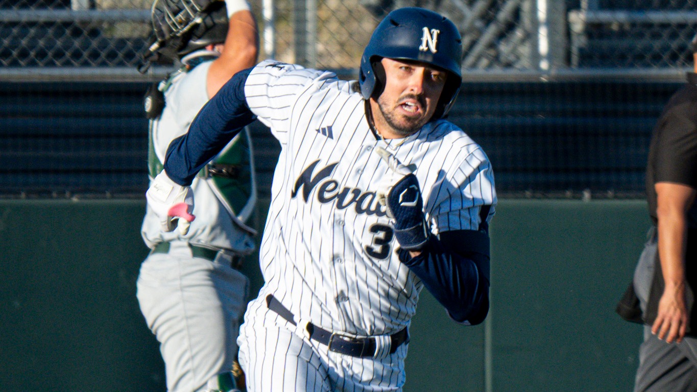 Noah Blythe running to first base after a hit