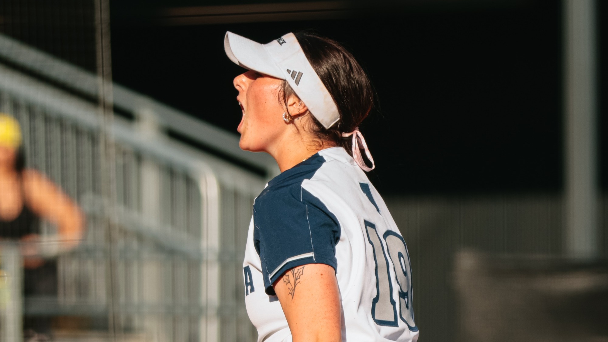 Talia cheering for strike out