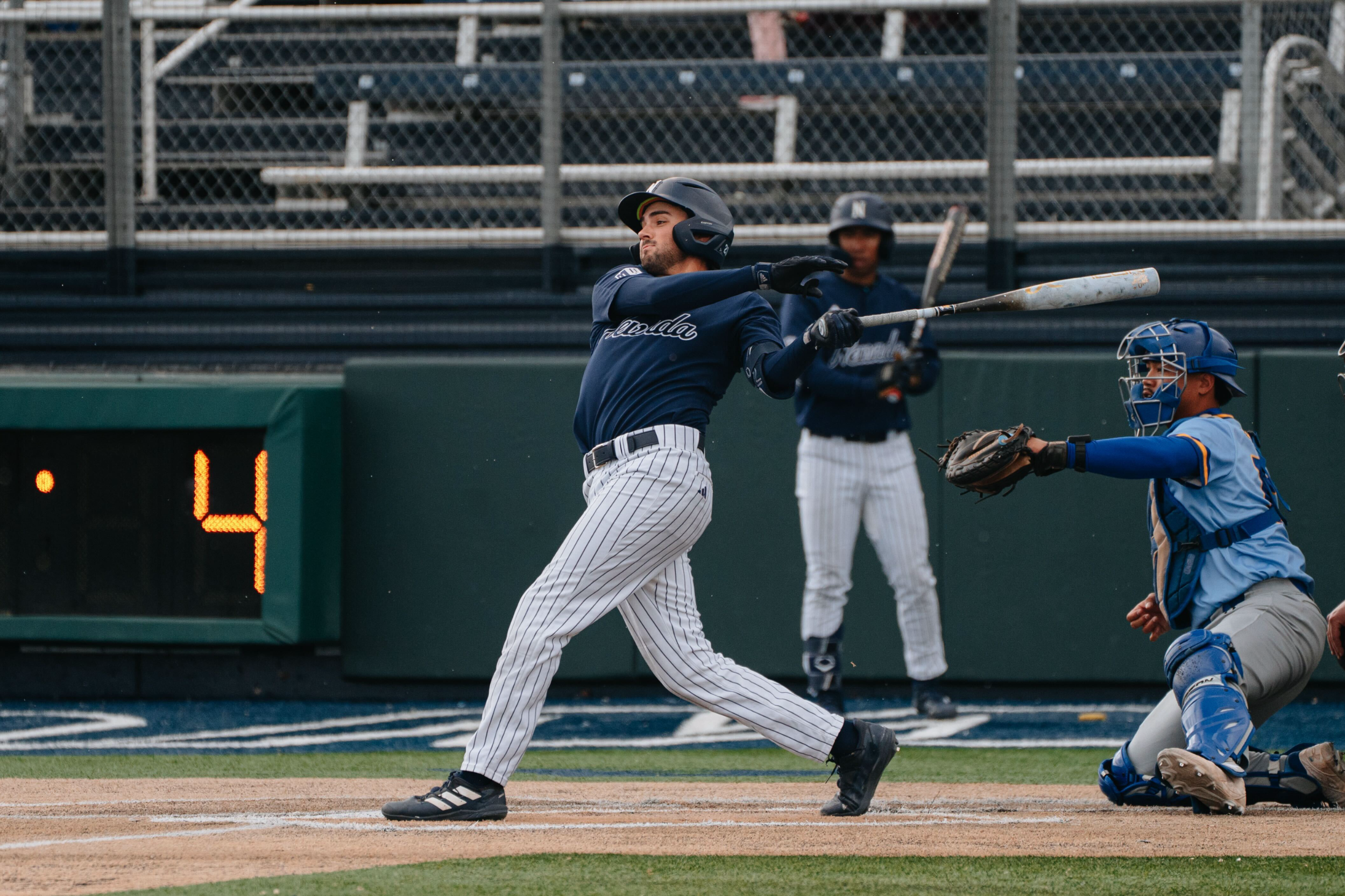 Jack Metcho follows through on a swing