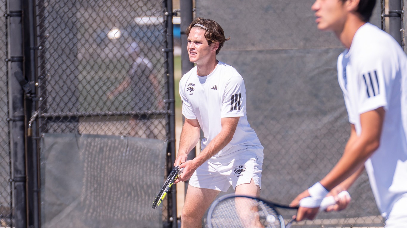 Greg Valente in doubles waiting to receive a serve