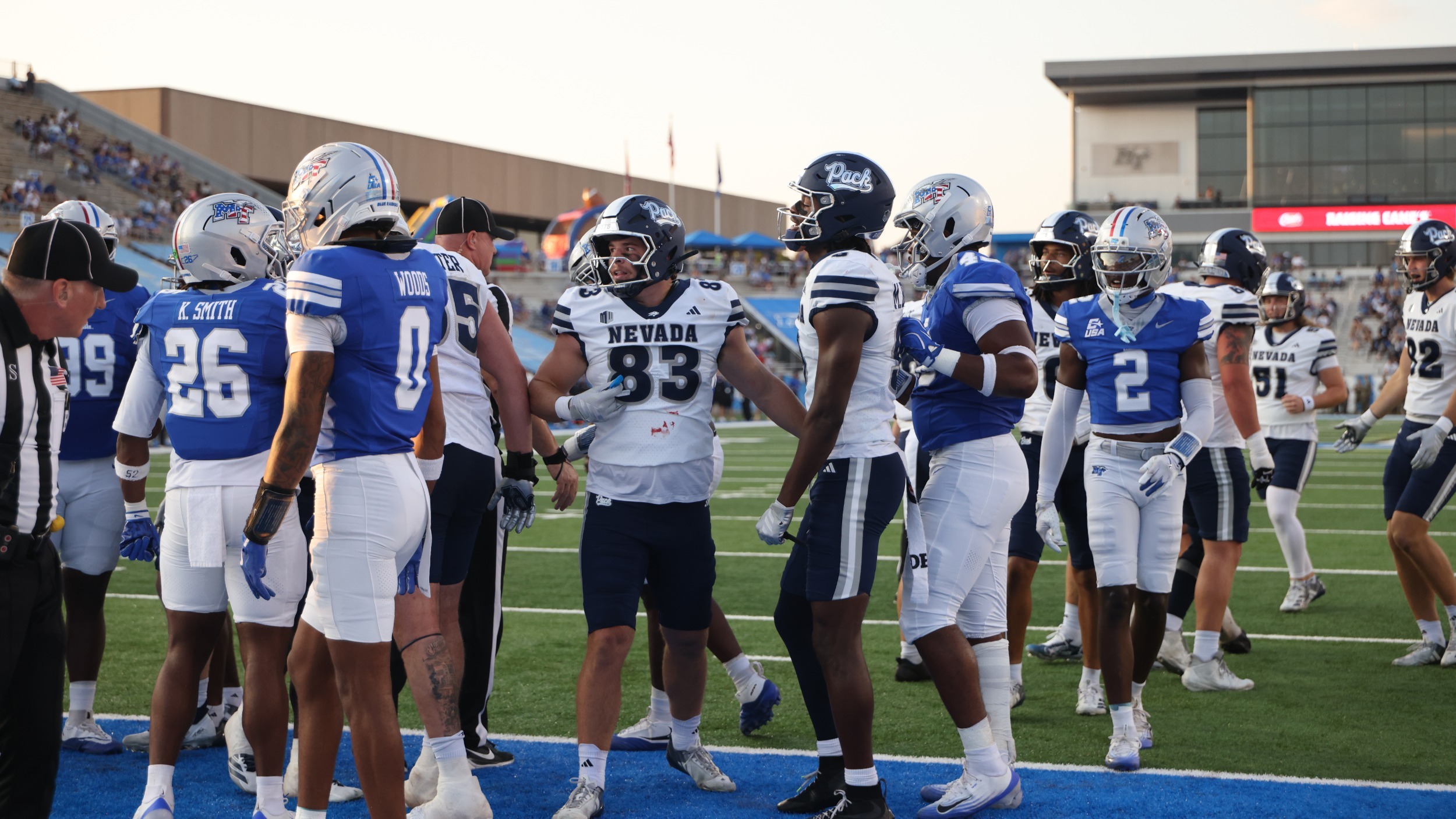 Nevada players celebrate after a Wolf Pack touchdown