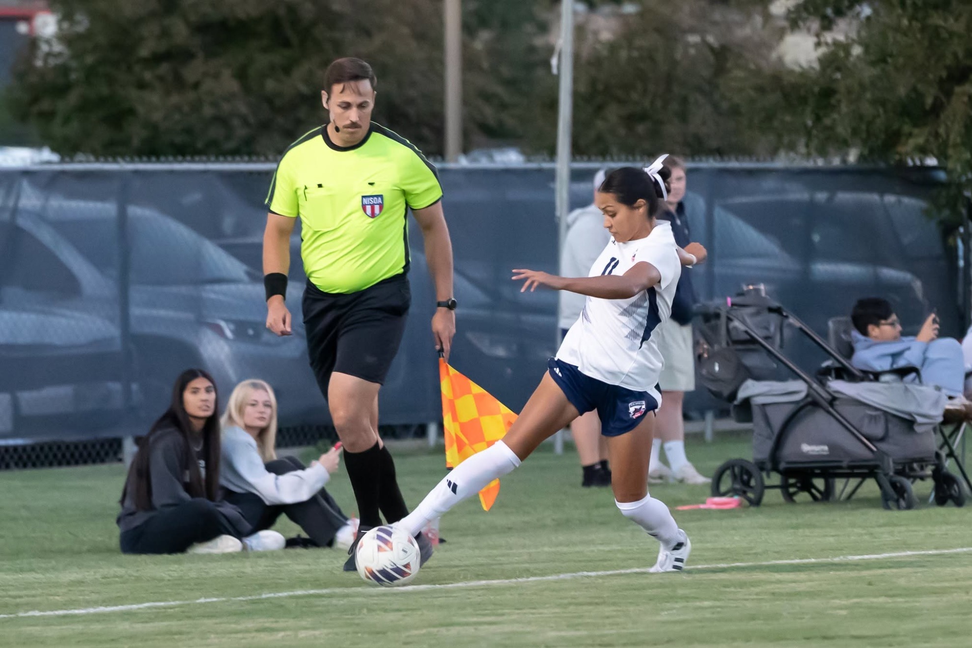 Allison Hernandez makes a kick on the ball