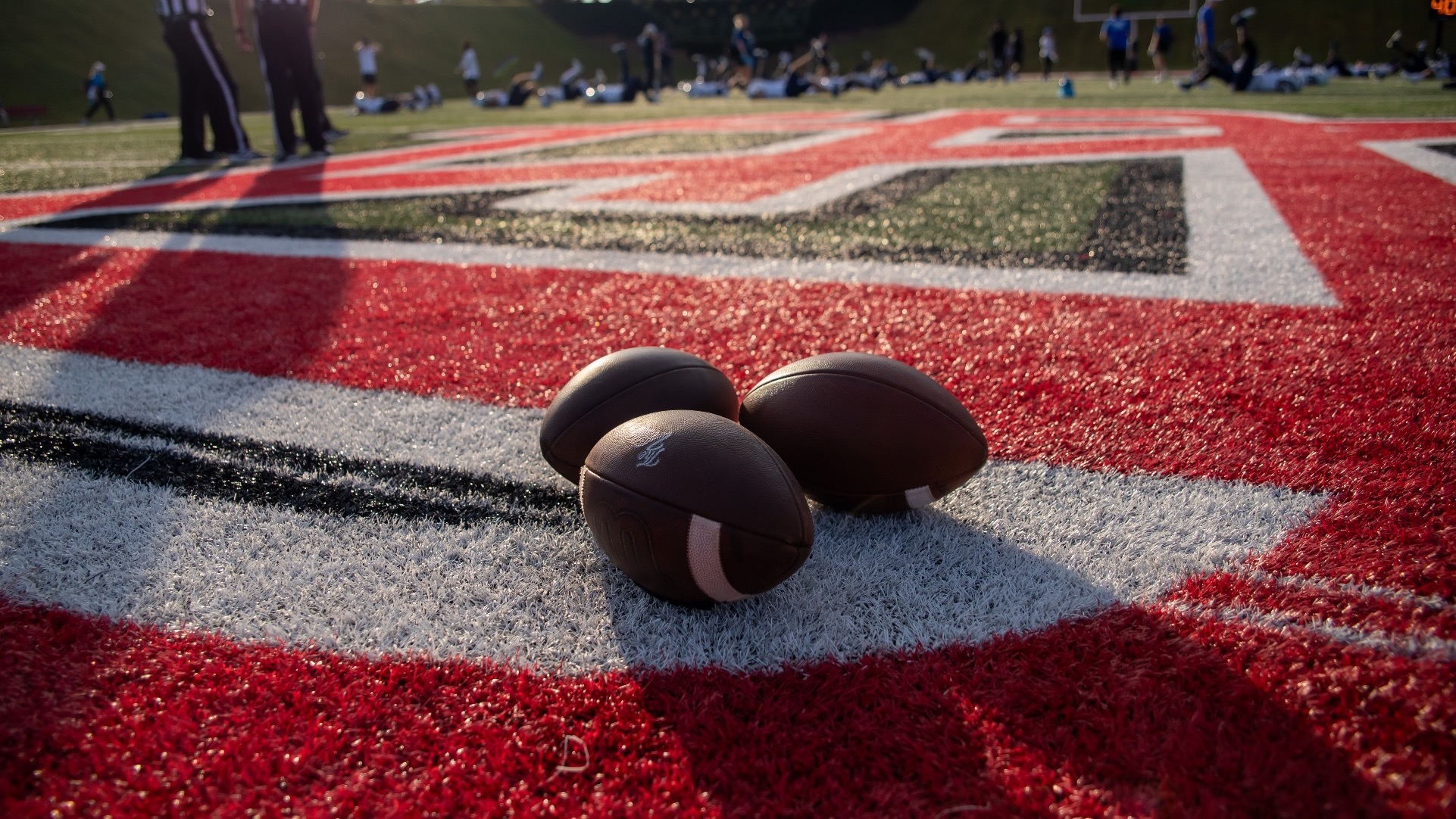 Footballs on 50 - yard line