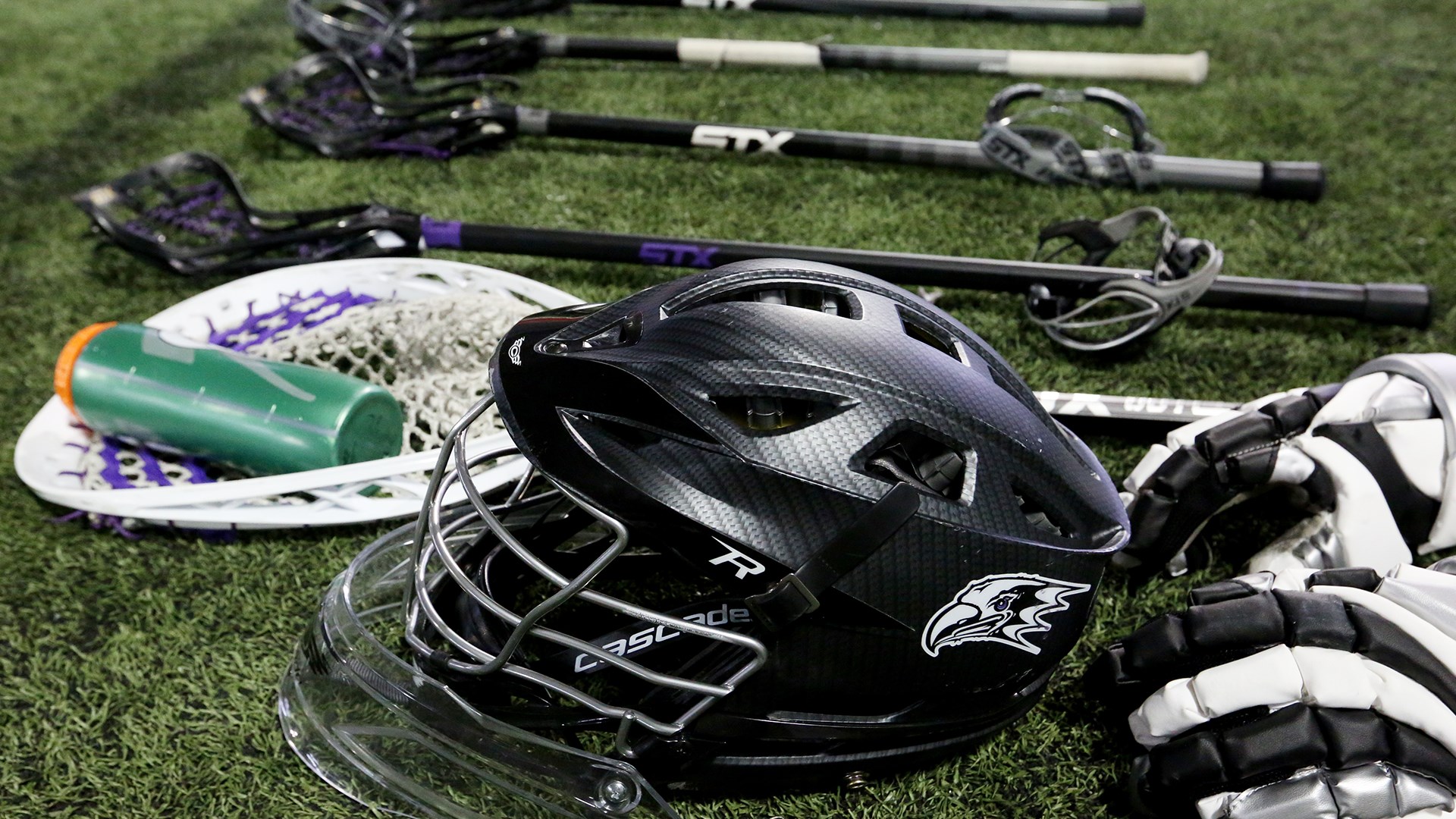 Lacrosse Helmet and Sticks
