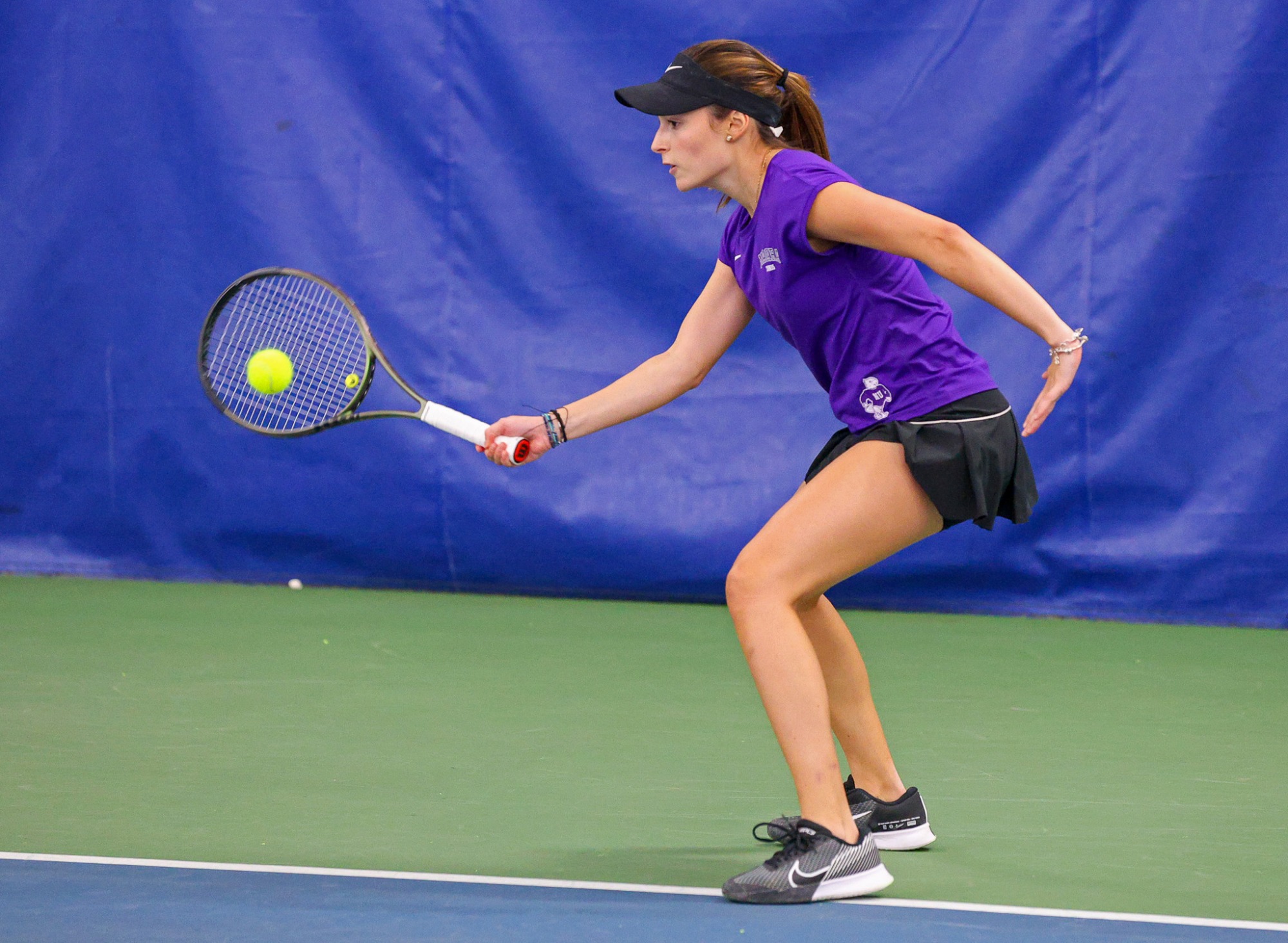 Niagara's Valeria Mora during her doubles match  against Penn State during their women's tennis match on Feb. 8, 2025.  Photo/Craig Houtz