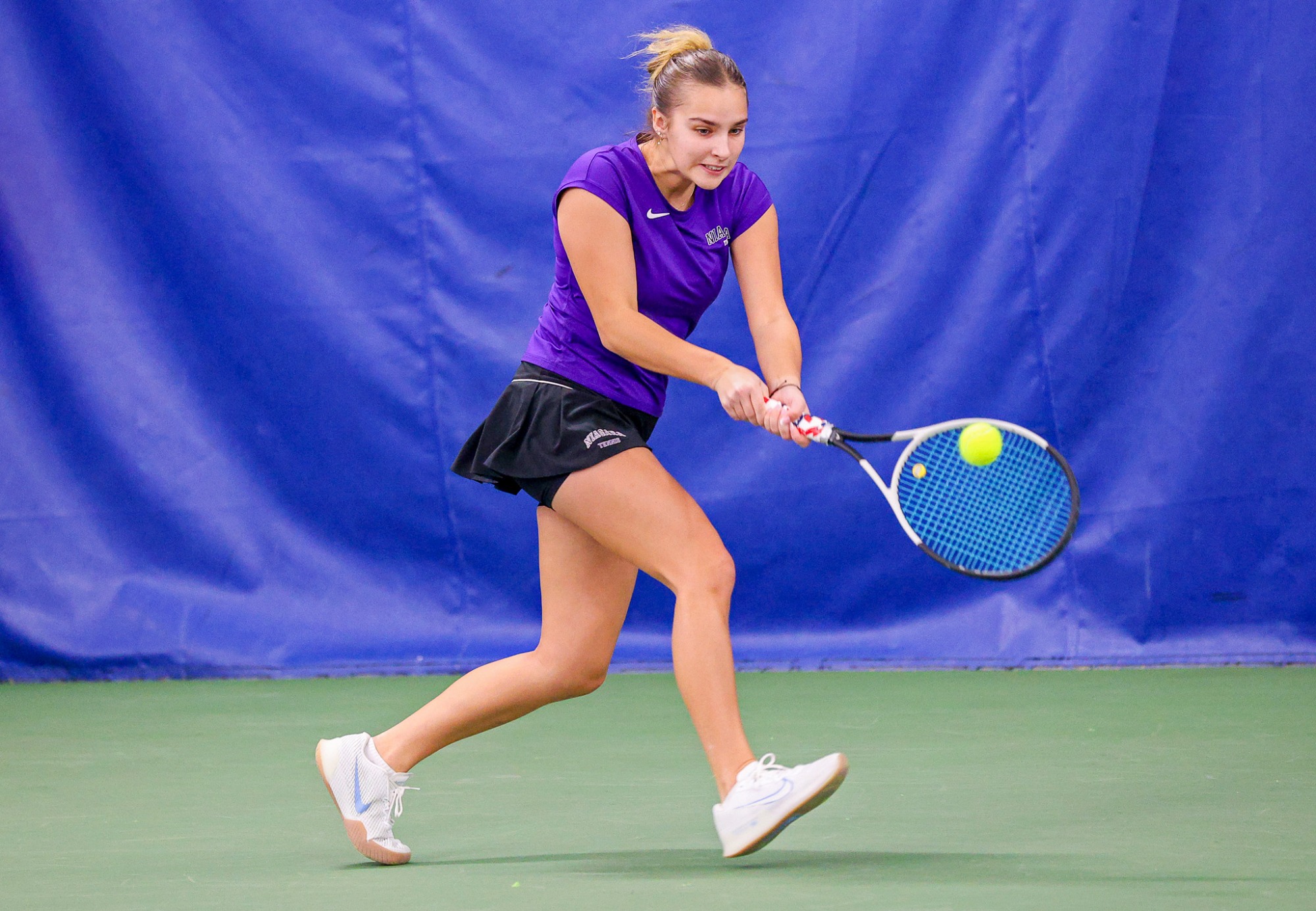 Niagara's Larisa Kotok  during her doubles match  against Penn State during their women's tennis match on Feb. 8, 2025.  Photo/Craig Houtz