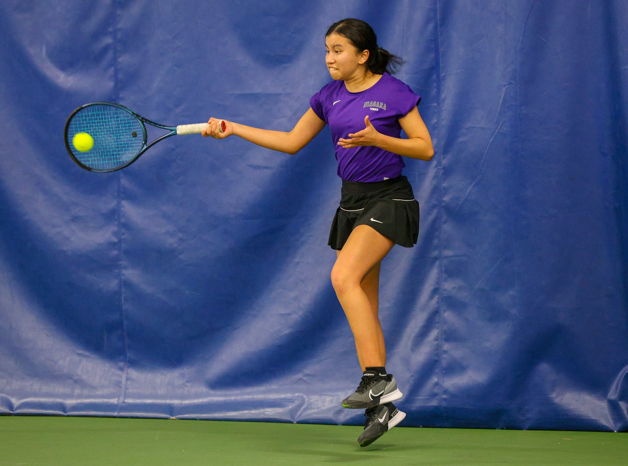 Niagara's  Isabel Garcia during her doubles match  against Penn State during their women's tennis match on Feb. 8, 2025.  Photo/Craig Houtz