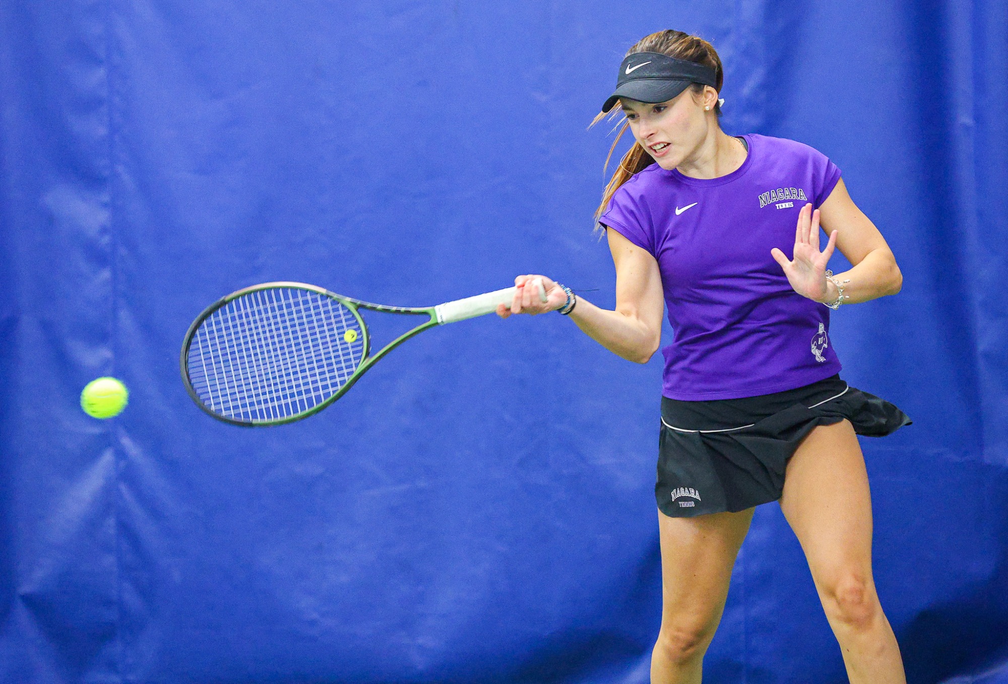 Niagara's  Valeria Mora during her doubles match  against Penn State during their women's tennis match on Feb. 8, 2025.  Photo/Craig Houtz