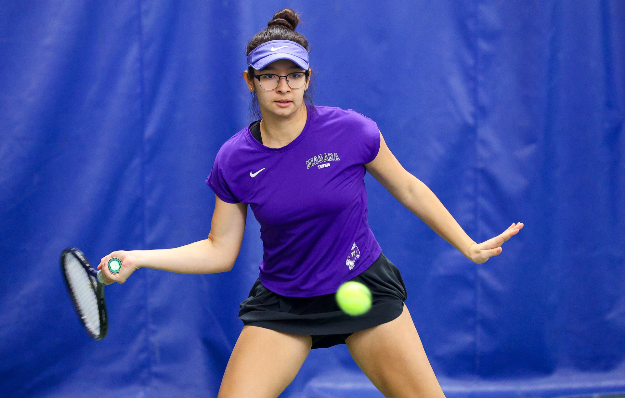 Niagara's  Gabriela Melo during her doubles match  against Penn State during their women's tennis match on Feb. 8, 2025.  Photo/Craig Houtz
