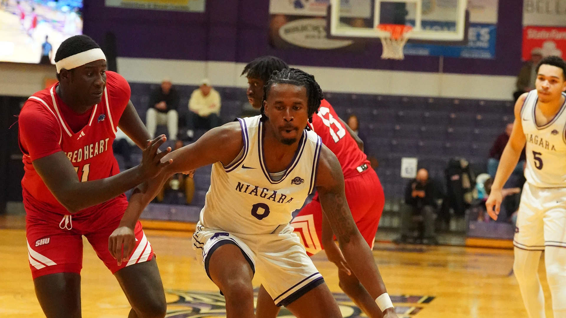 Justin Hawkins Dribbles the Ball Against Sacred Heart 2026