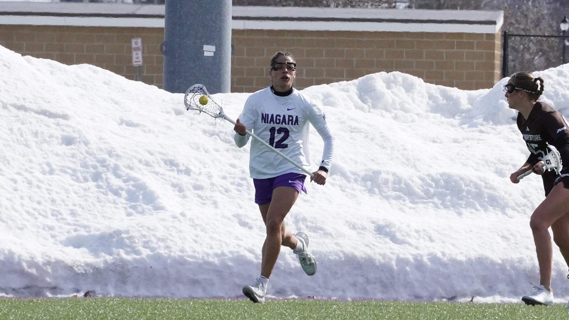 Maddy Gill Runs With the Ball Against St. Bonaventure 2026