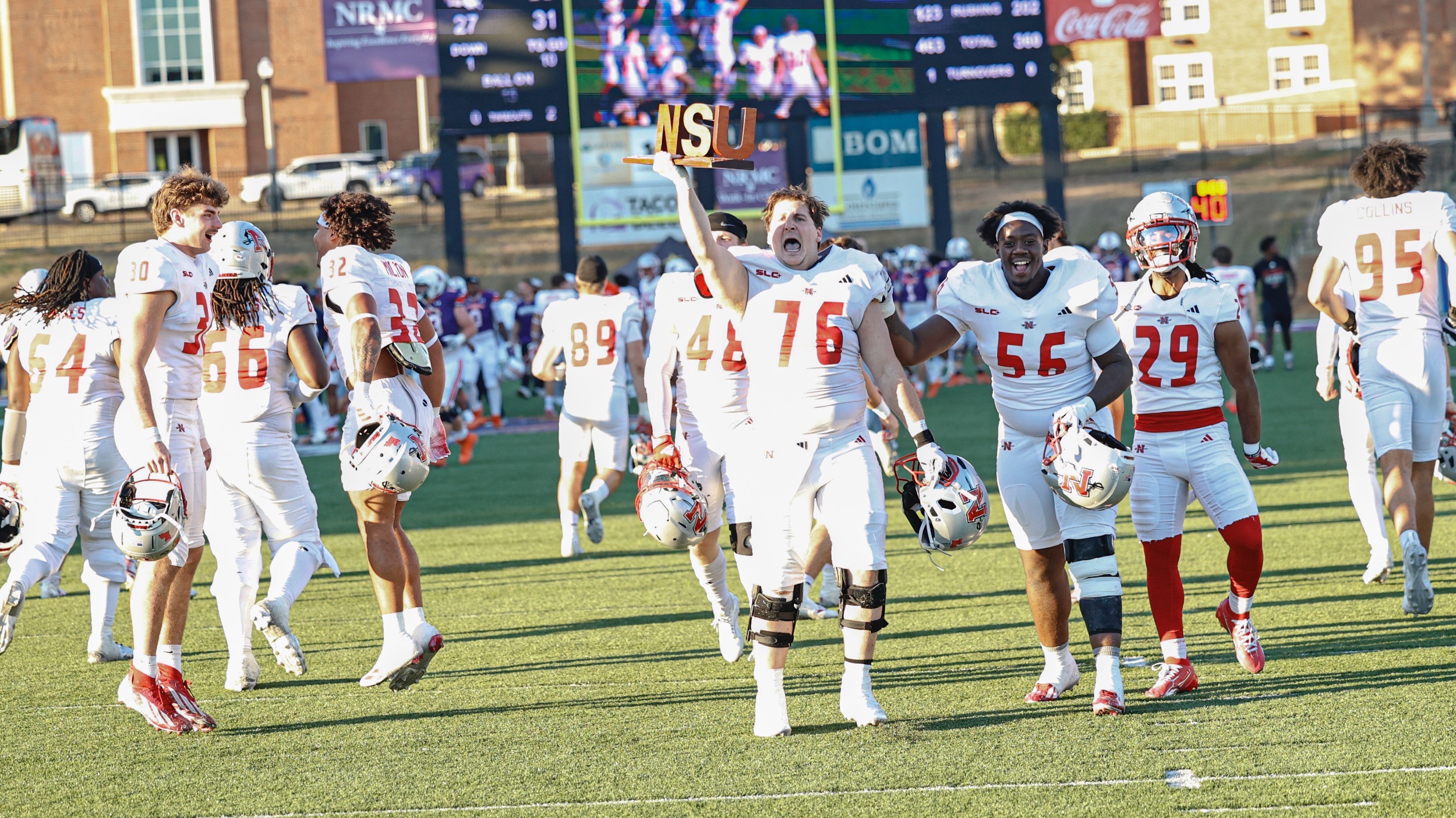Nicholls Football Celebrates after winning the NSU trophy