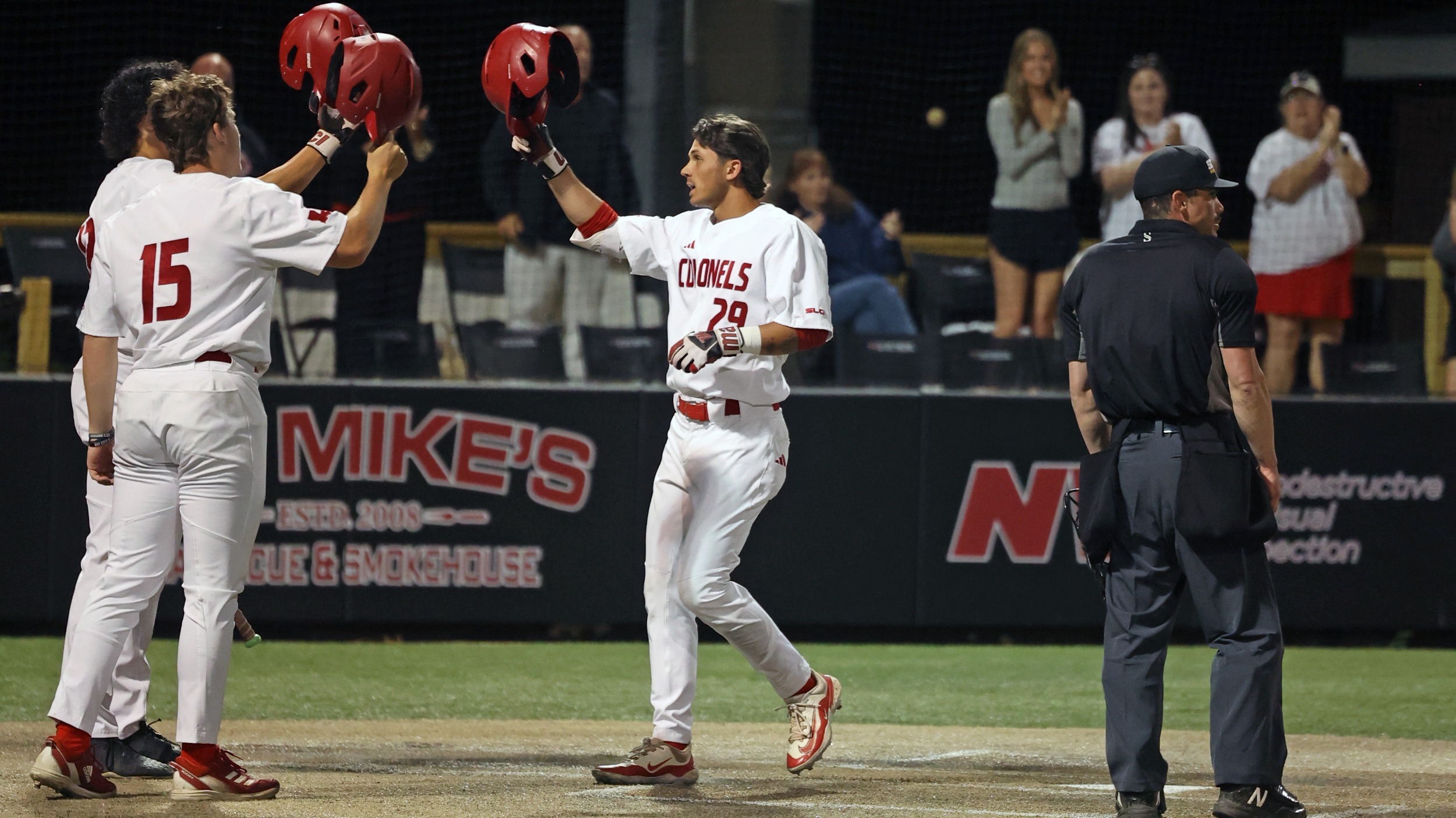 Keegan Giger Celebrates HR with teammates.