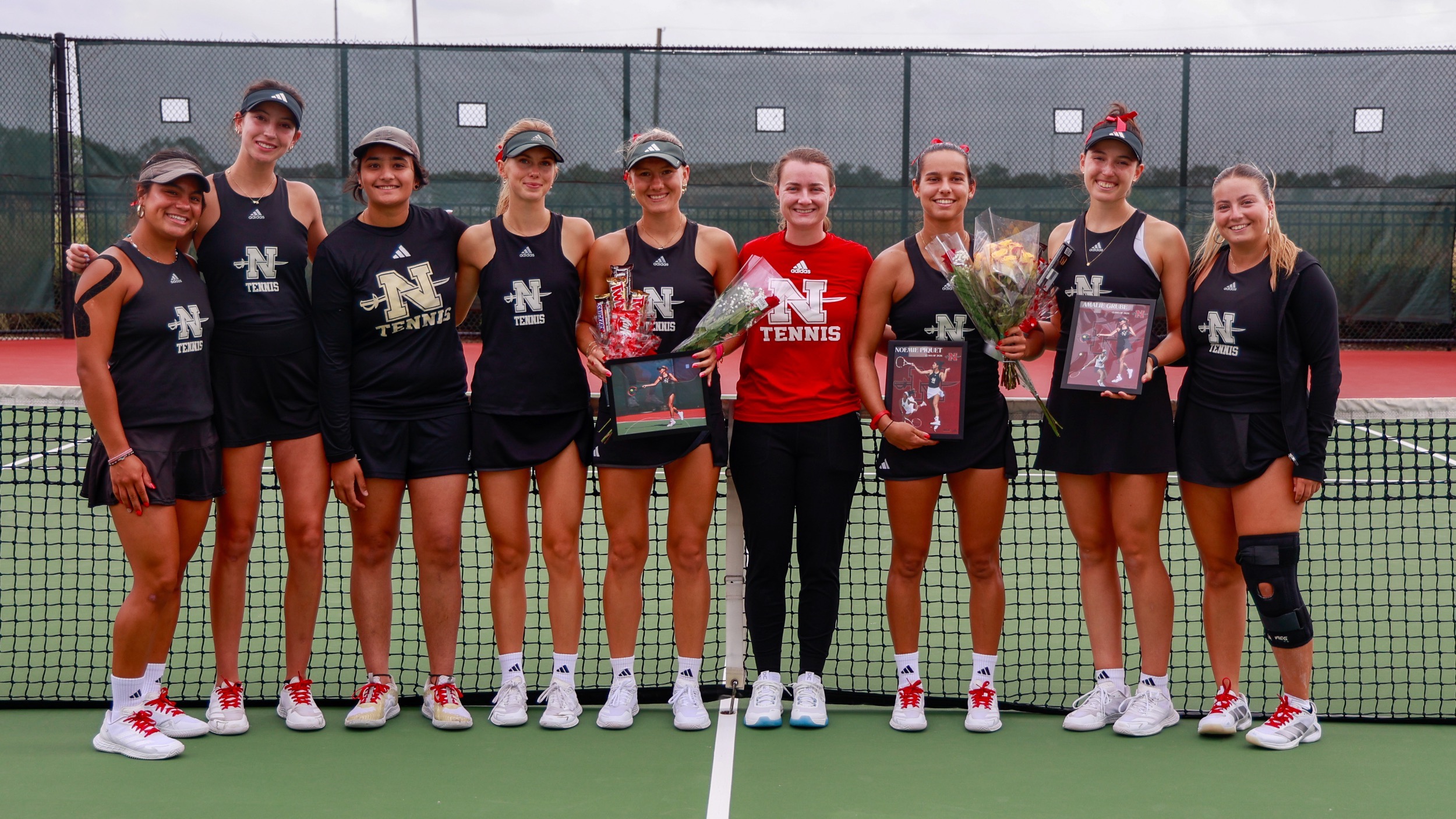 The 2026 Nicholls Women's Tennis Team poses for a photo for Senior Day