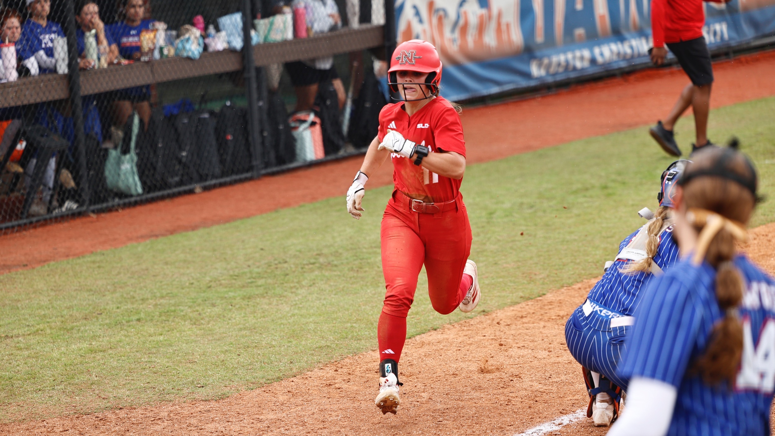 Laylin Sturm races home to score for Nicholls Softball