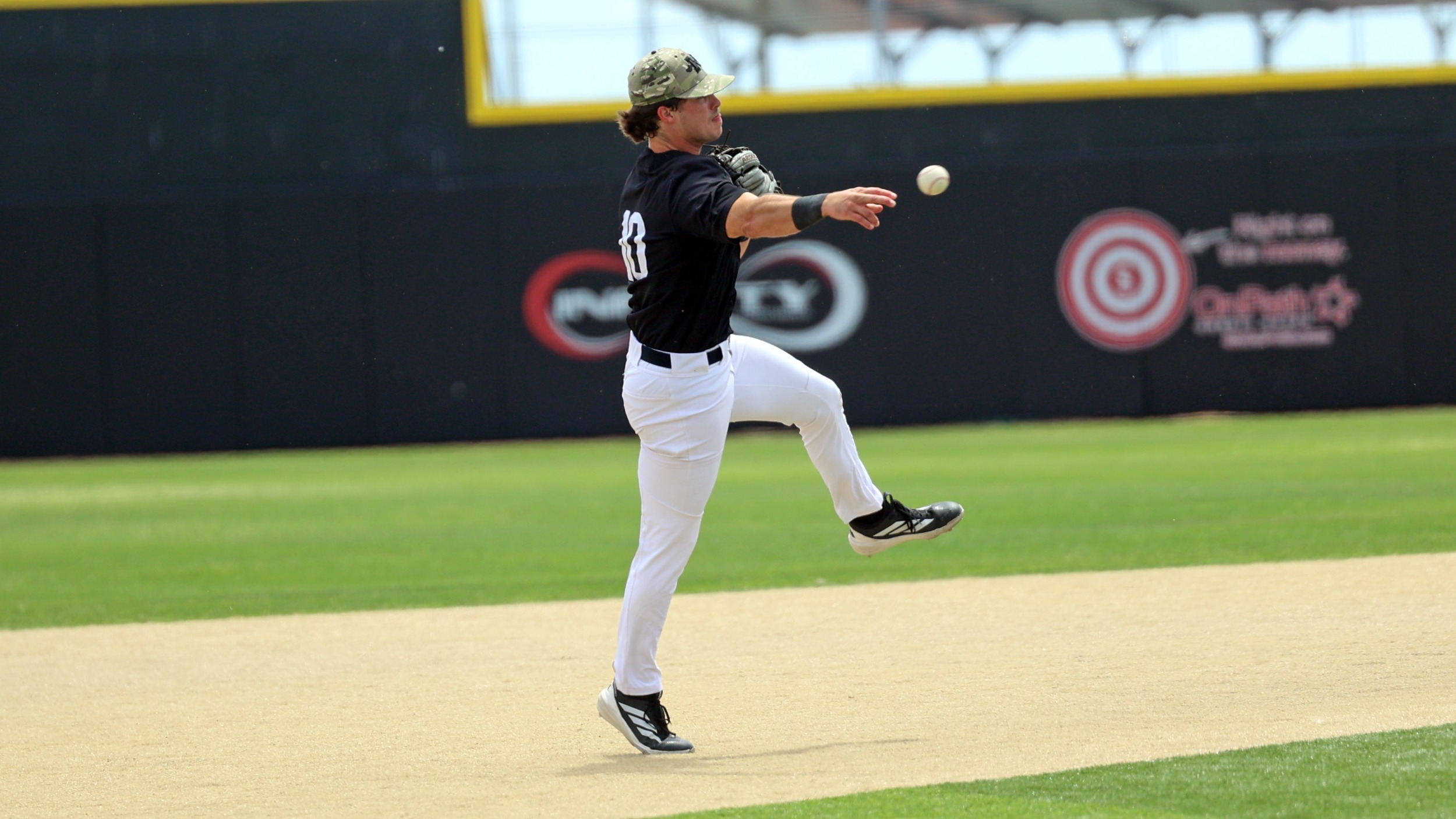 Jaxon Milam Throws to First Base
