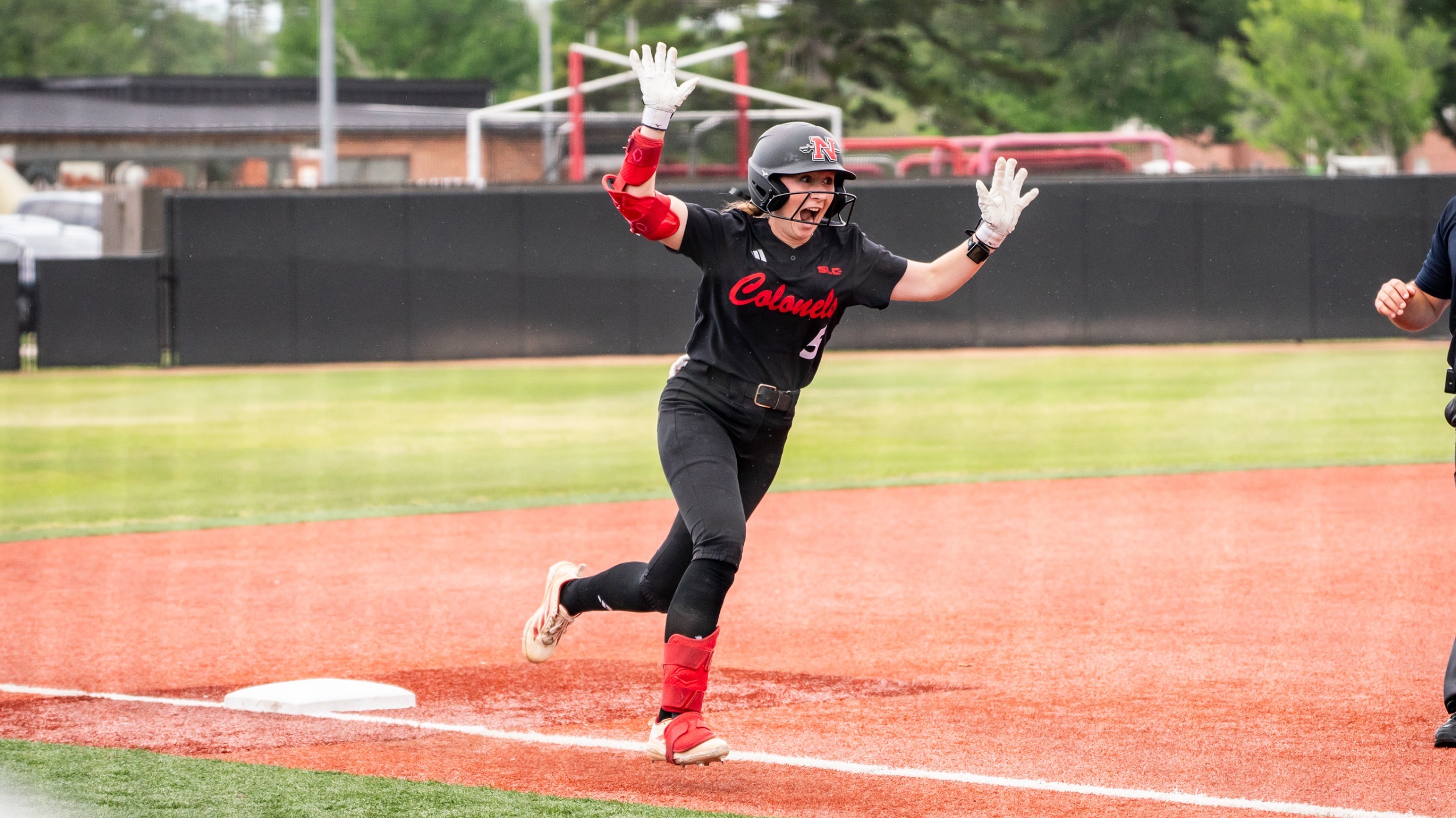 Erin Krause celebrates after hitting a home run for Nicholls Softball
