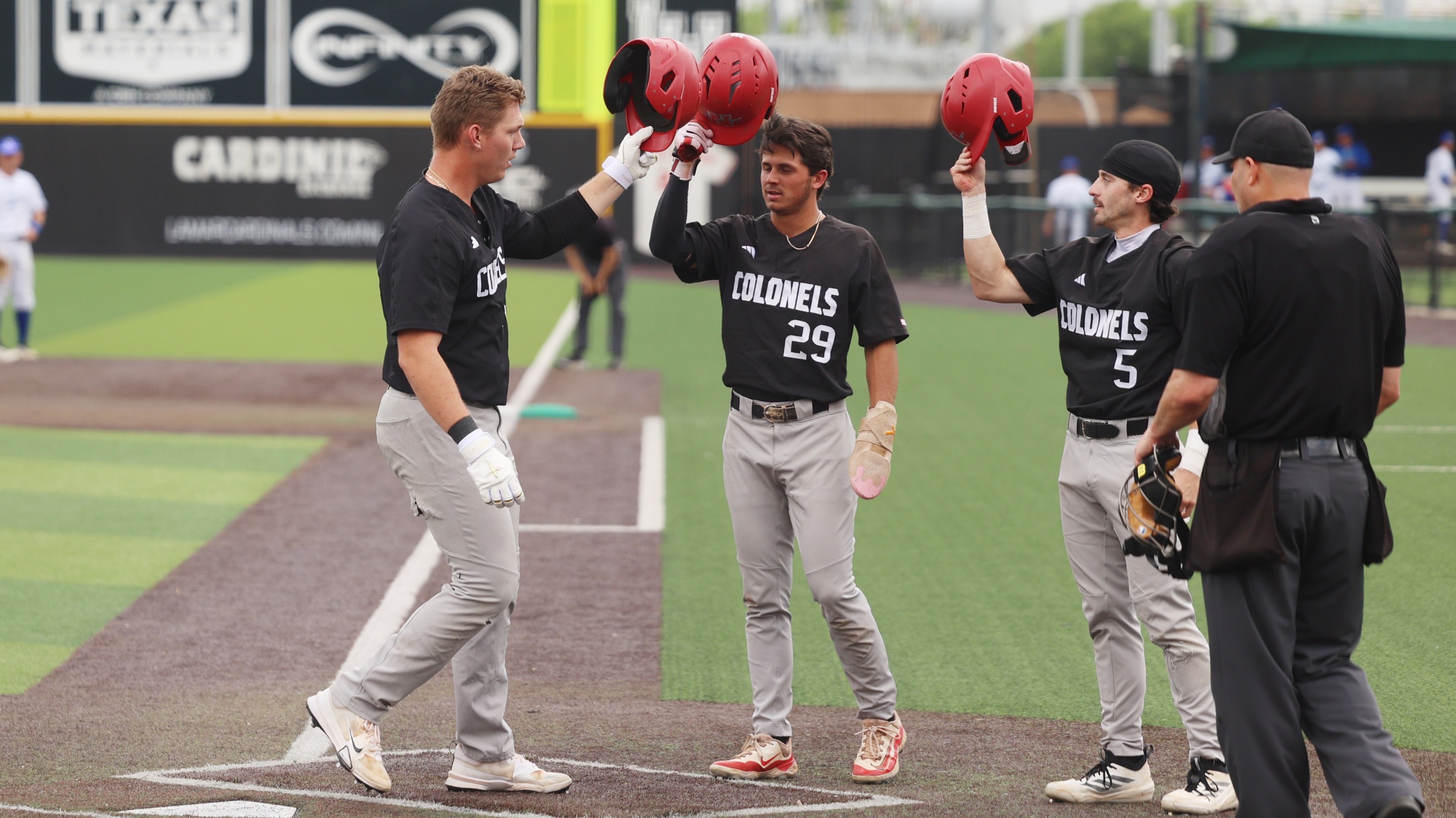 Caston Thompson celebrates at home plate after hitting a home run for Nicholls Baseball
