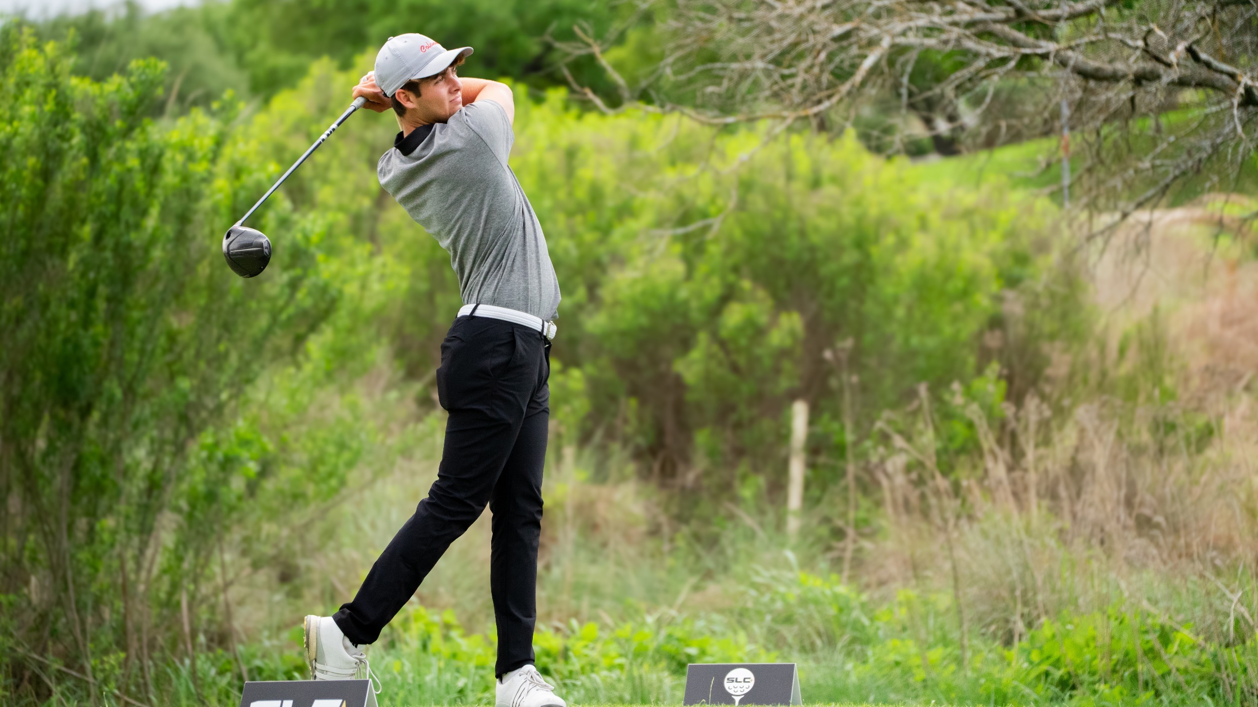 Ethan Marx watches his tee shot