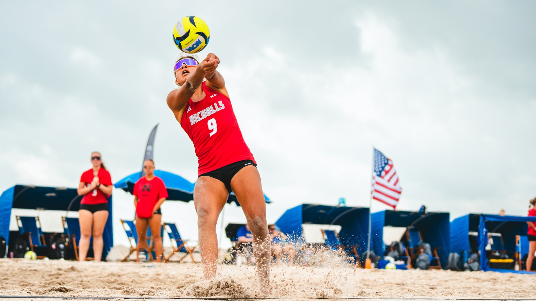 A Matalanna passes ball during beach volleyball match
