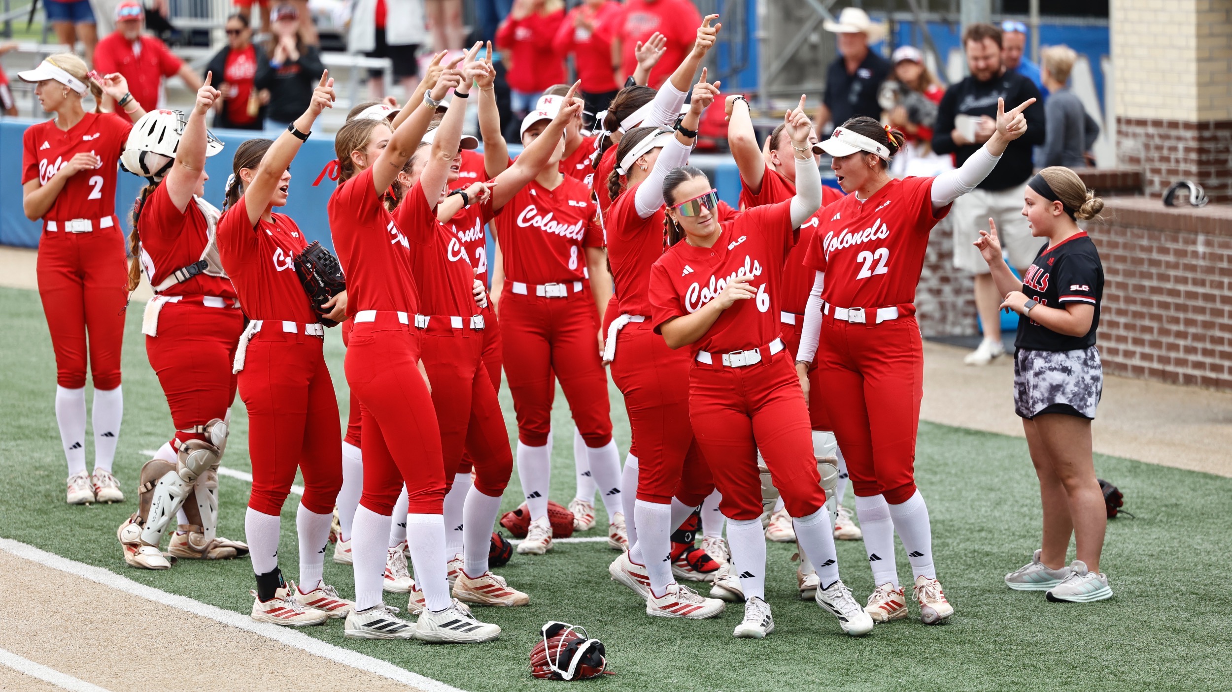 The Nicholls Softball team celebrates after winning their tournament game