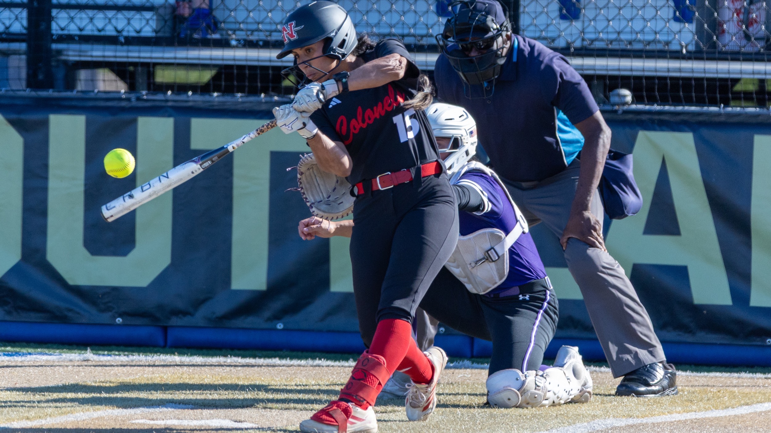 Lilianna Robledo drives a base hit for Nicholls softball