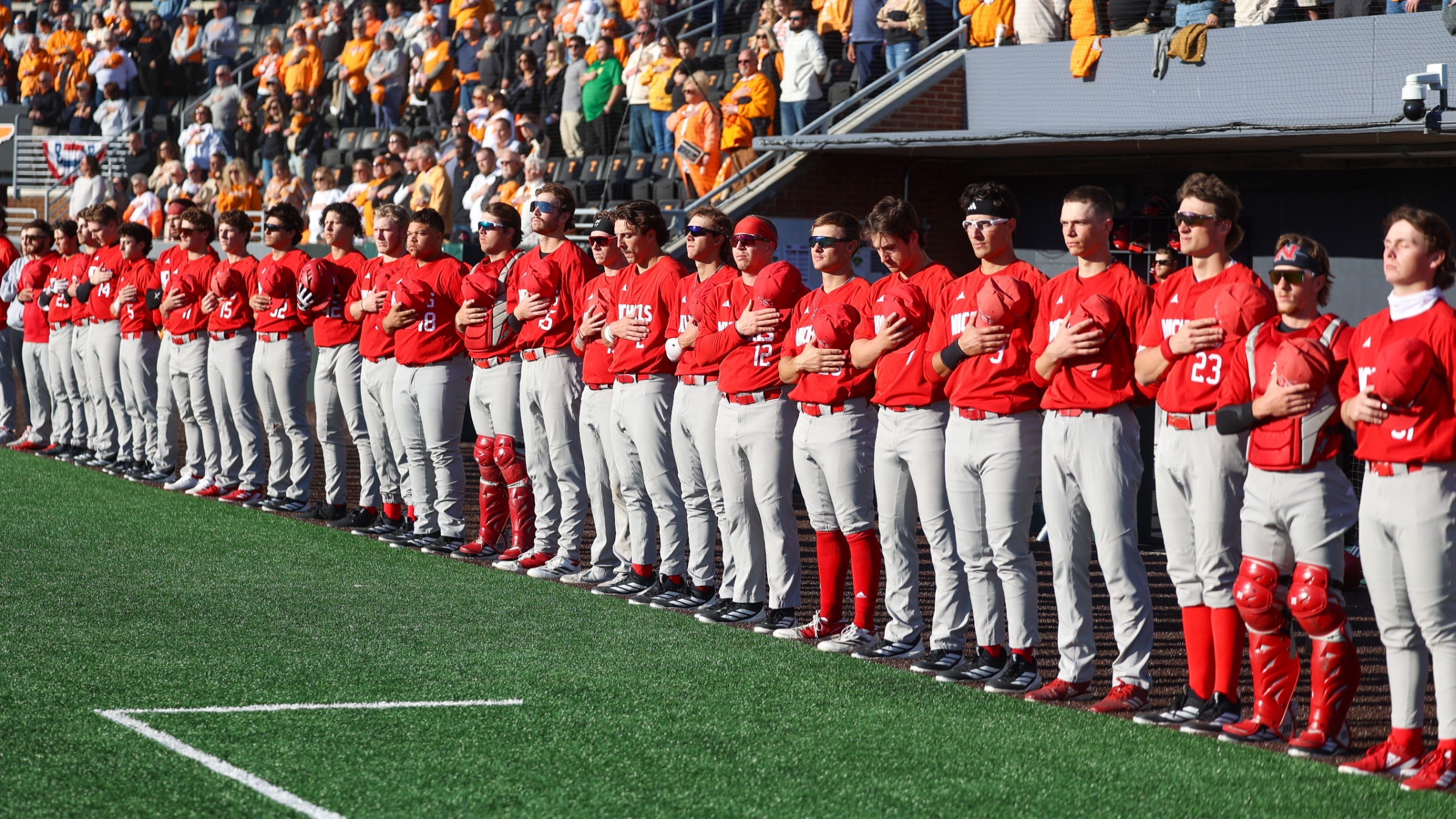 2026 Nicholls Baseball Team Stands in line for National Anthem at University of Tennesee