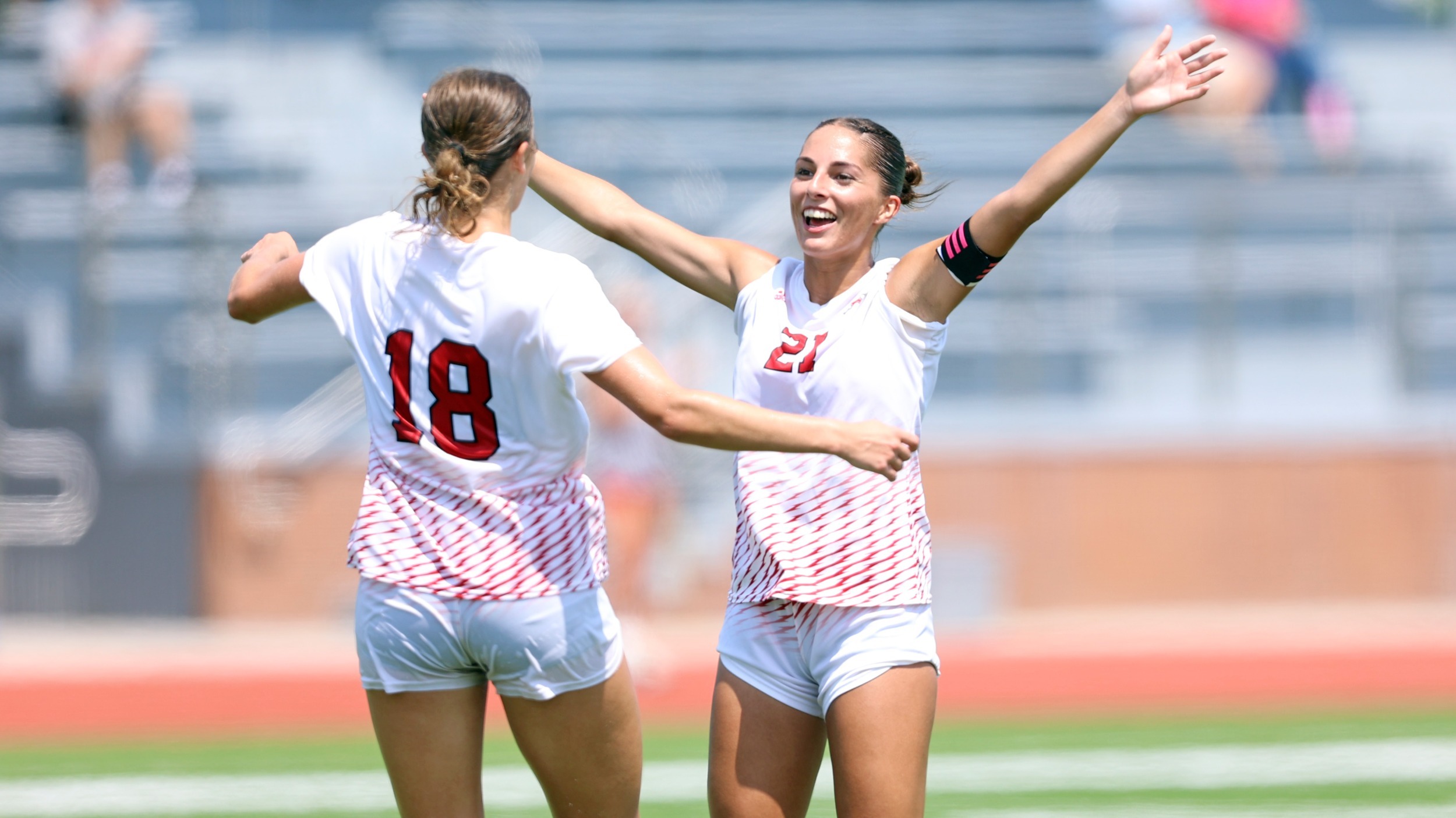 Sammi Doyle and JEzlyn Nelson celebrate goal against Grambling