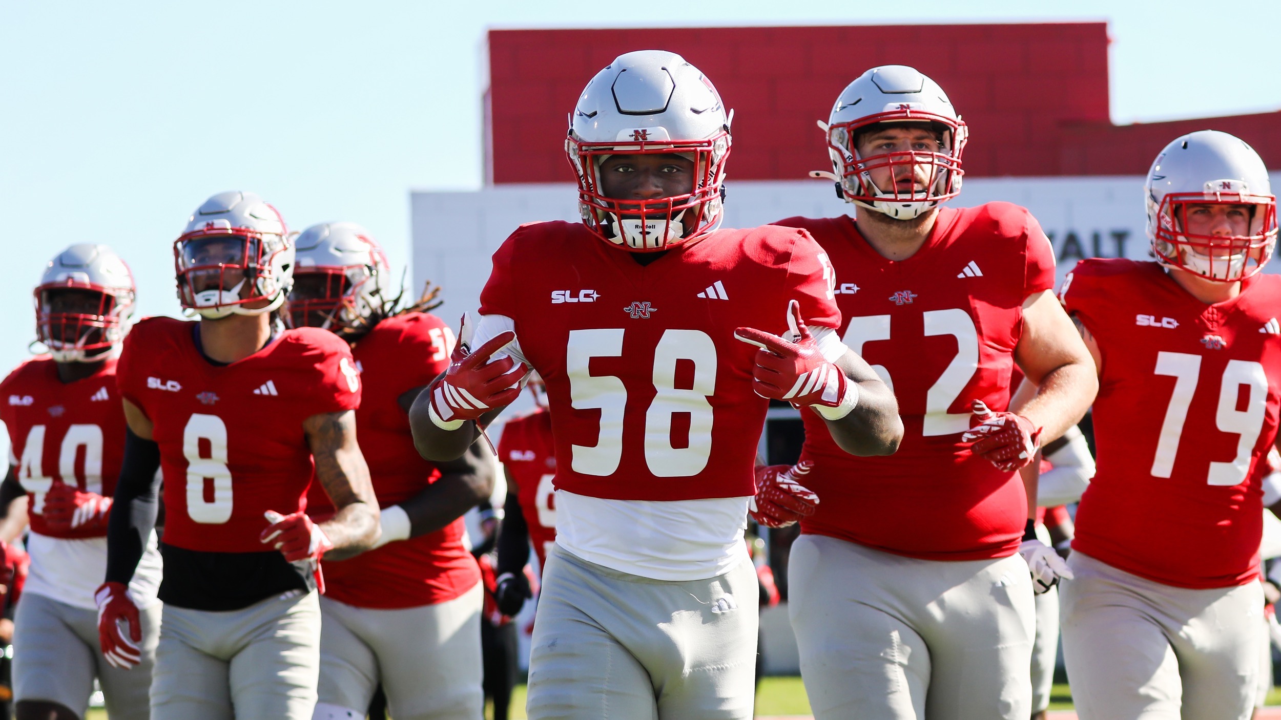 The Nicholls Football team runs out of the locker room before its game vs HCU