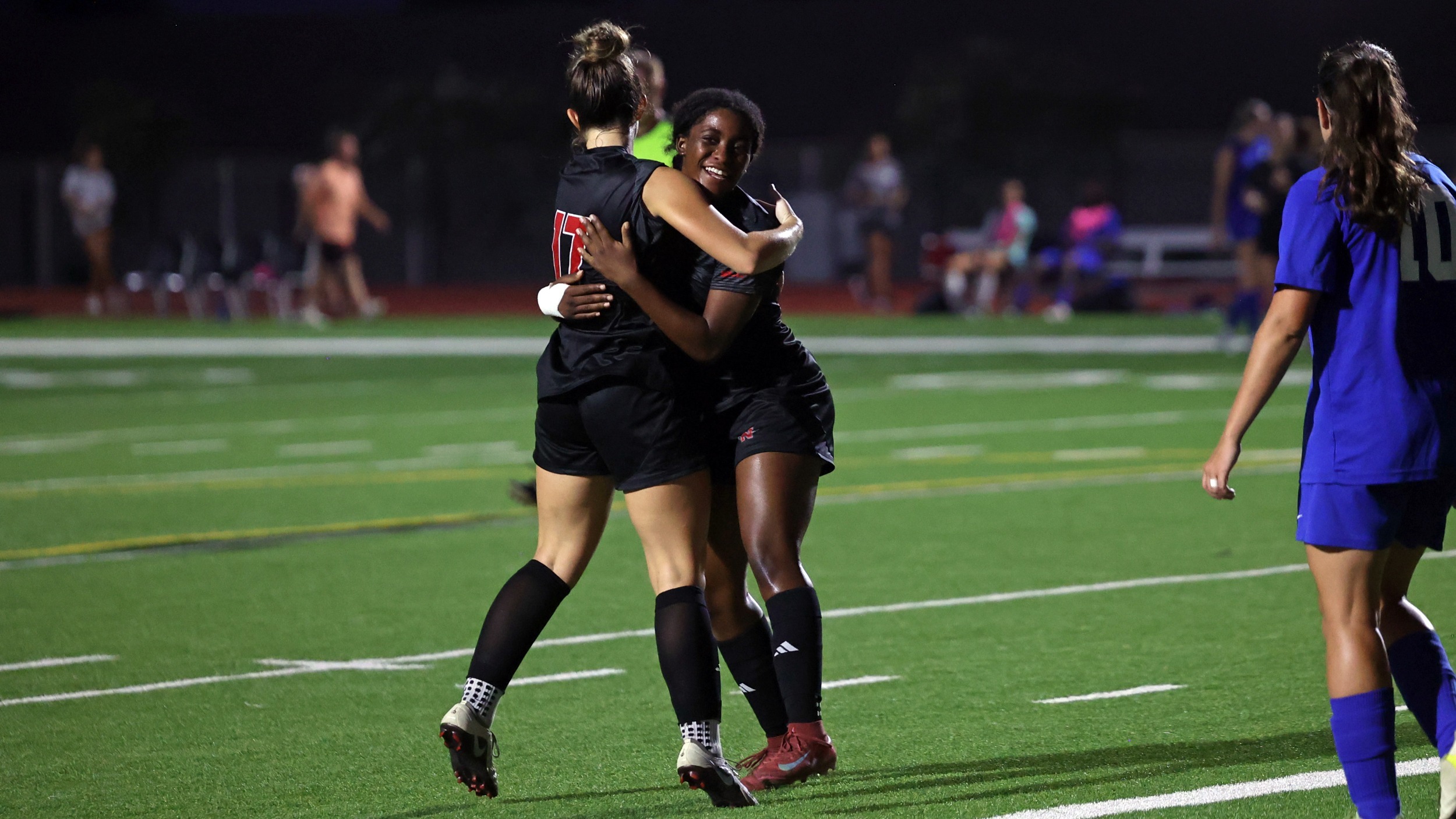 Kaylie HArris and Jessica Anvonyo celebrate goal for Nicholls soccer