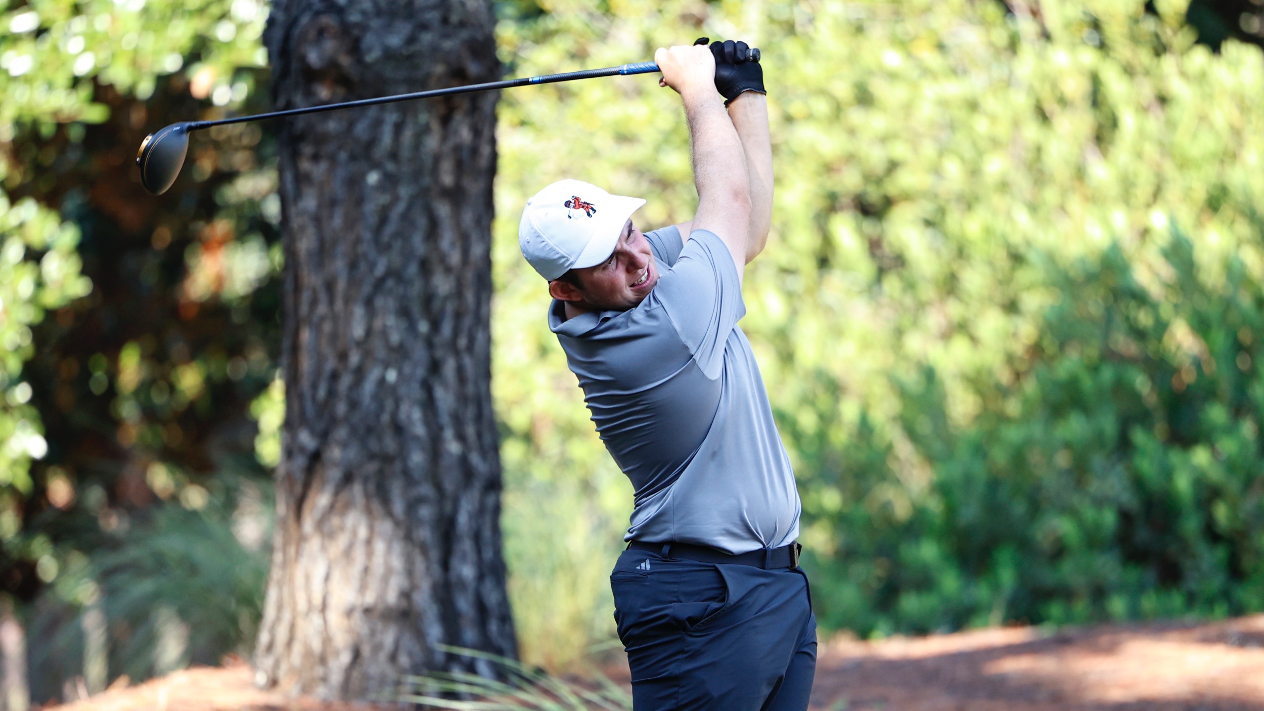 James Bould tees off for the Nicholls Golf team