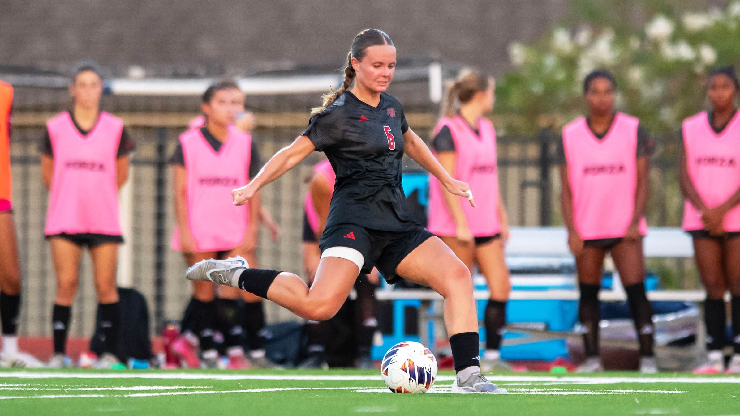 Thea Patuel takes free kick during Nicholls soccer match