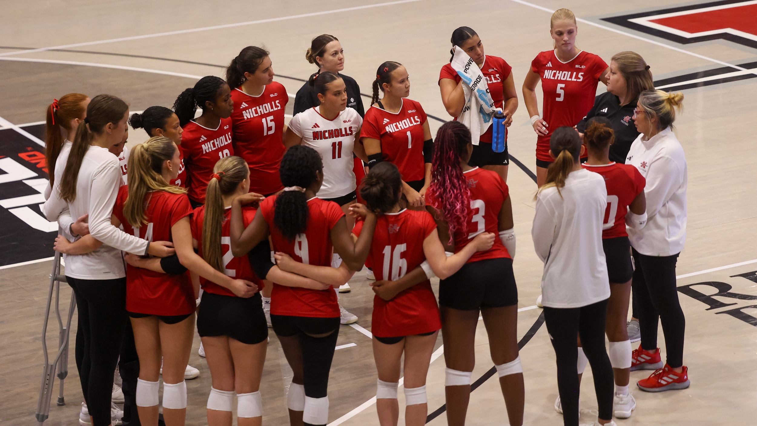 Nicholls VB Team huddle during a timeout