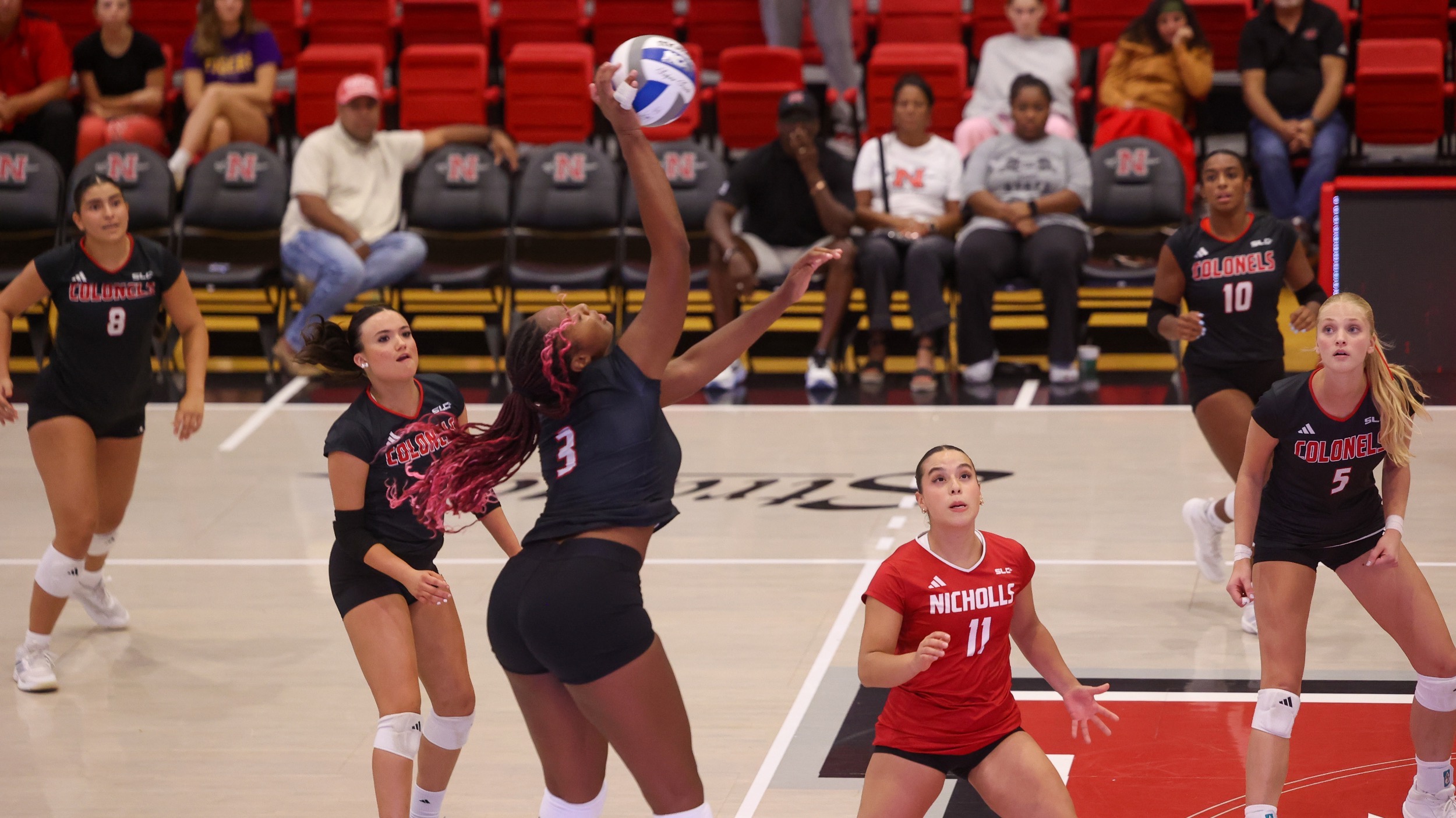 Zahahrah Edwards-Wyllie goes for a kill for Nicholls Volleyball