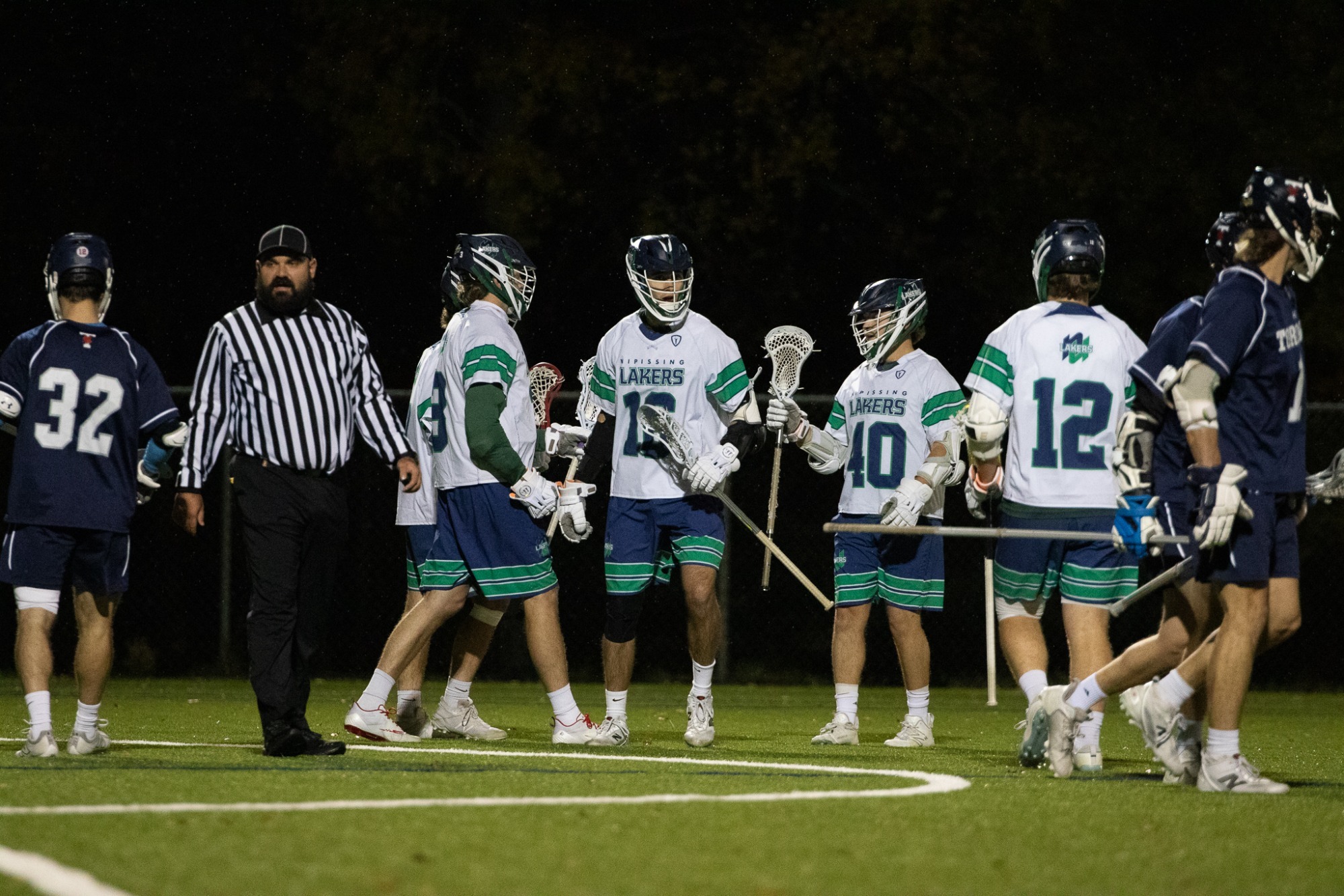 Nipissing Lakers Lacrosse celebrates a goal against U of T
