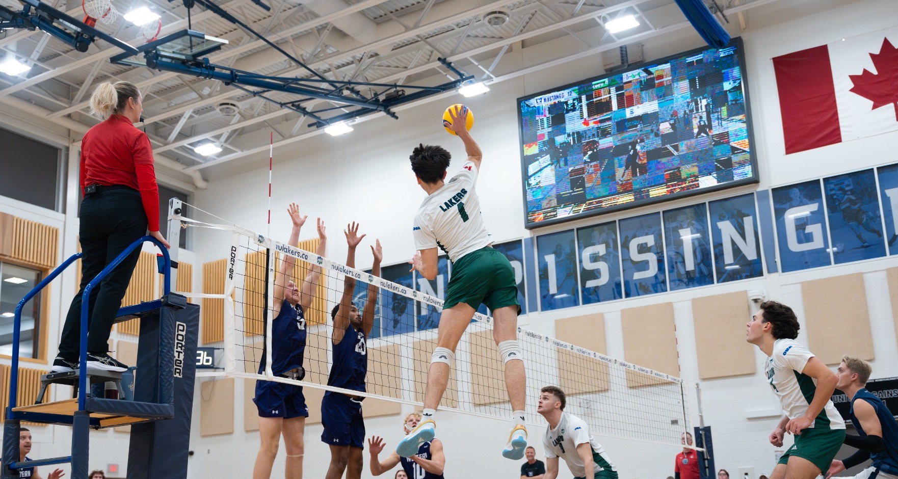 Kasunich spikes the ball for Nipissing