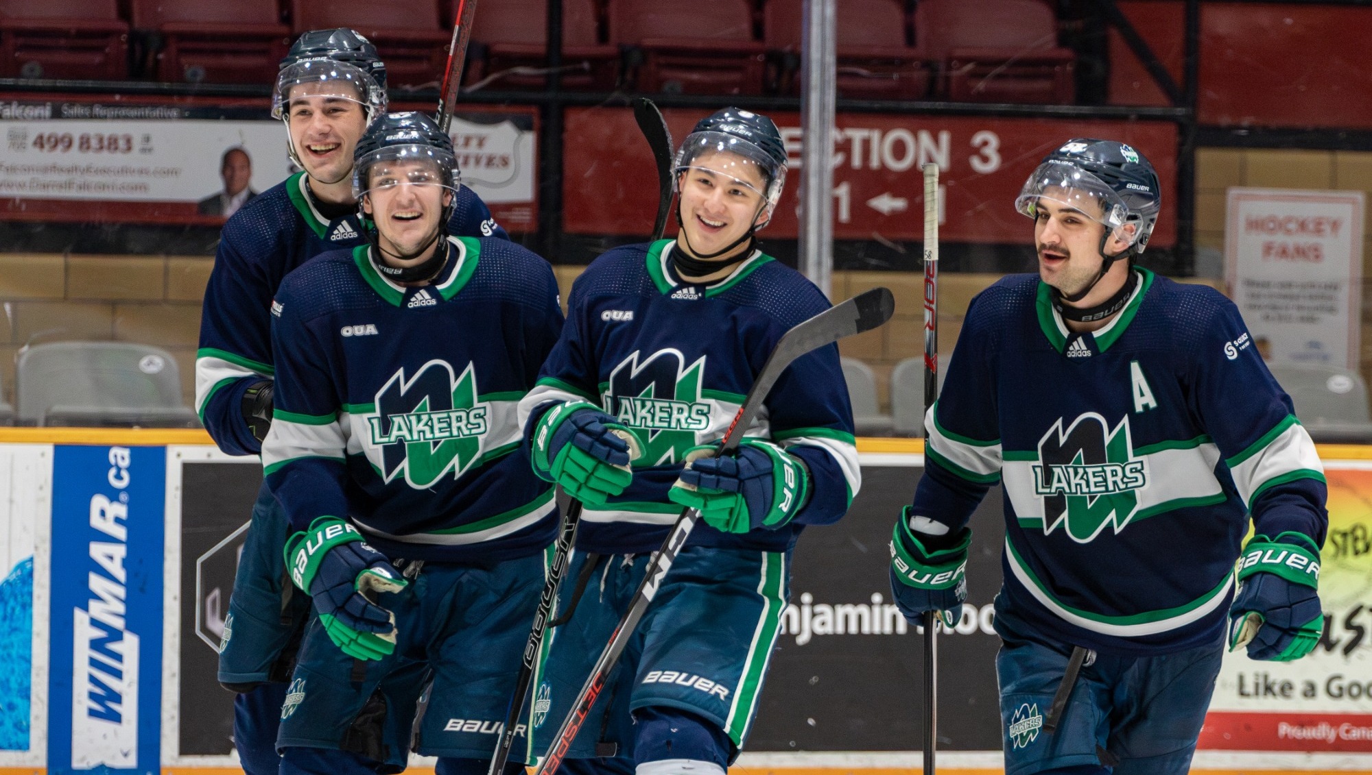 The Lakers celebrate a goal against Ontario Tech on November 30.