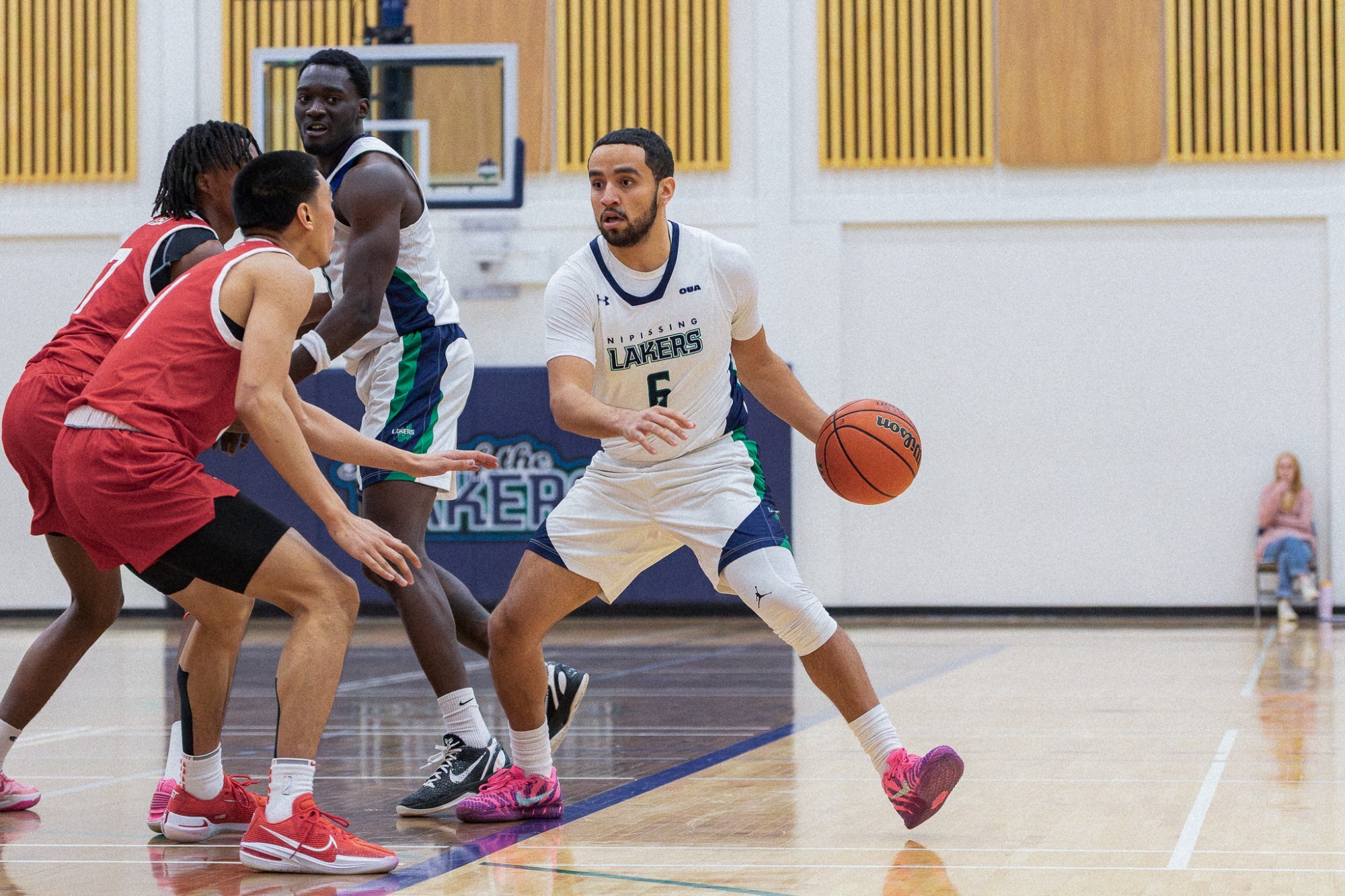 Brutus-Escalona drives the lane