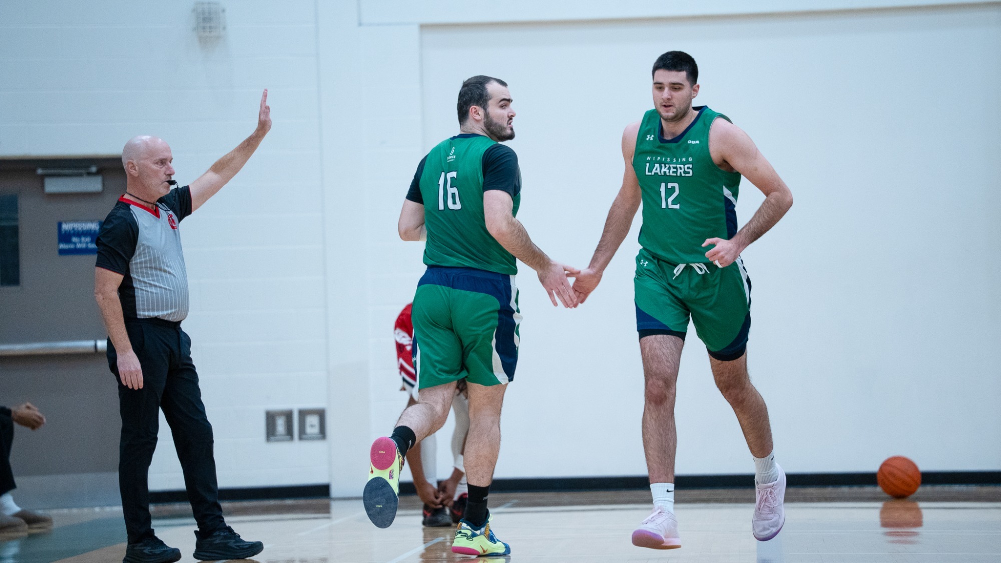 Ryan Heim and Mateja Vukic celebrate a score