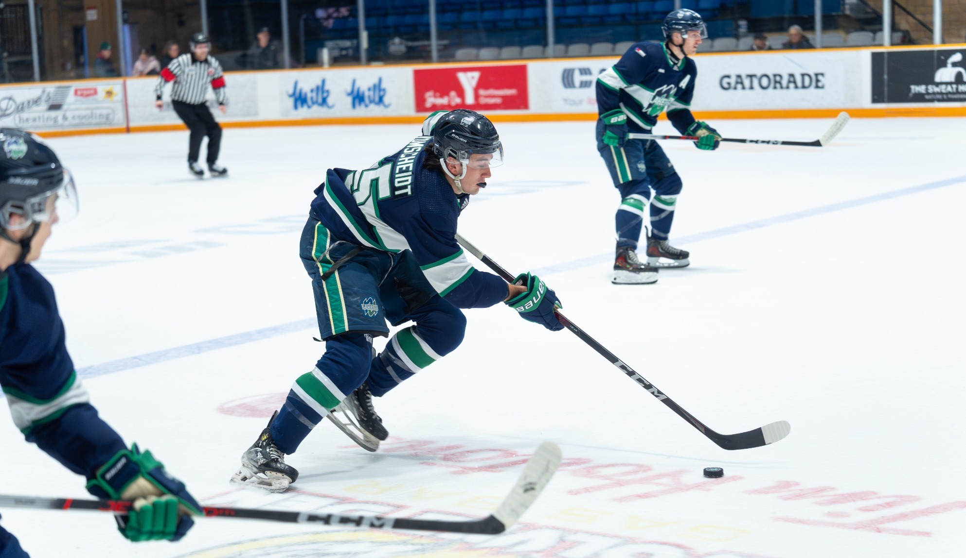 Vom Scheidt carries the puck across the red line