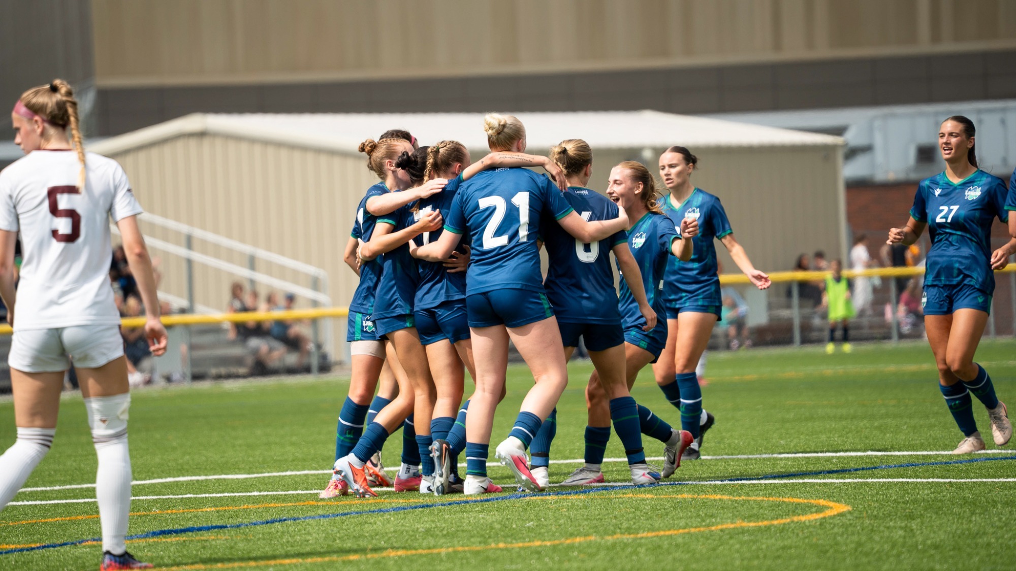 Women's Soccer celebrates a goal