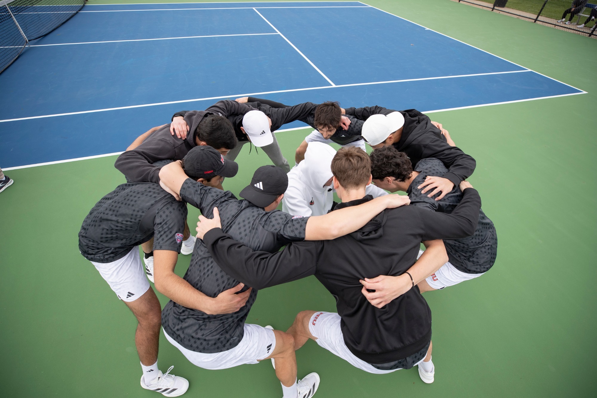 MTen26 team huddle
