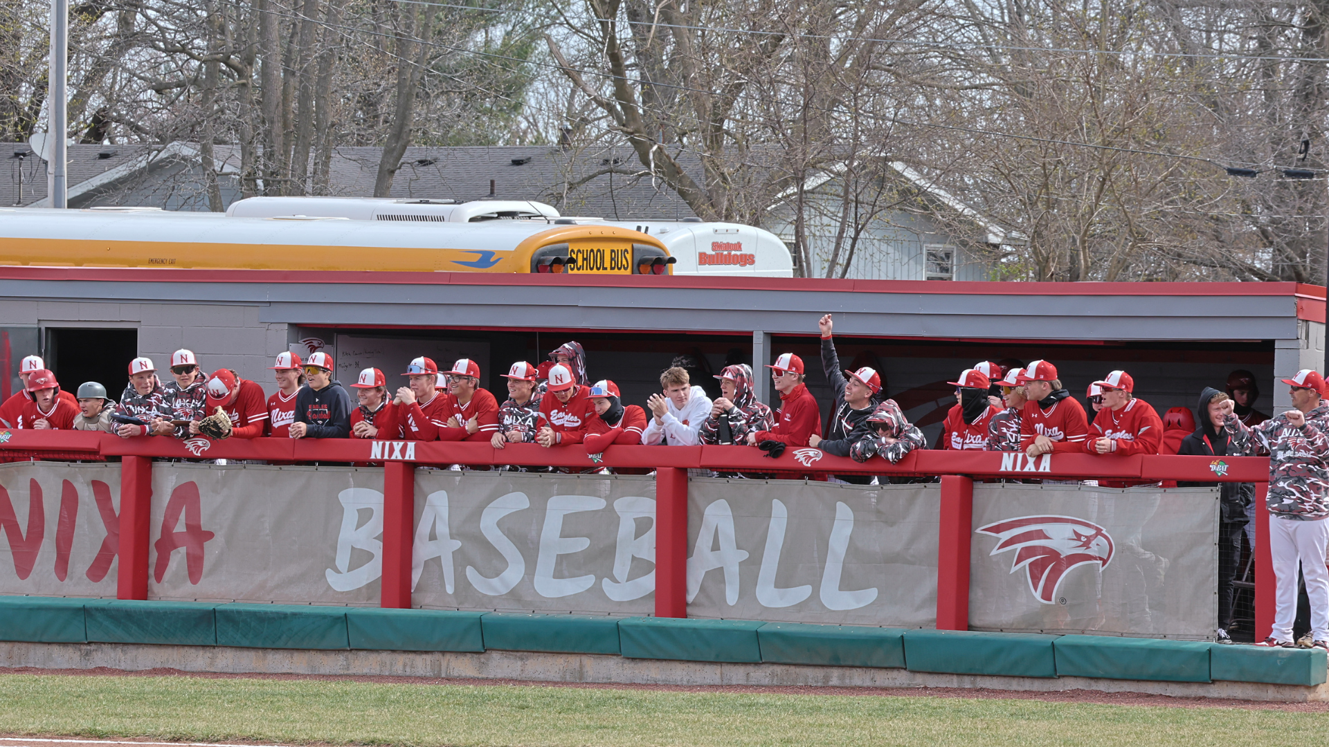 Nixa baseball celebrates in the dugout