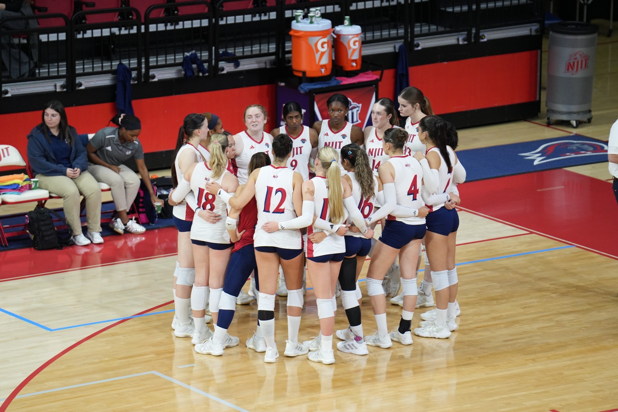 WVB team huddle vs Binghamton