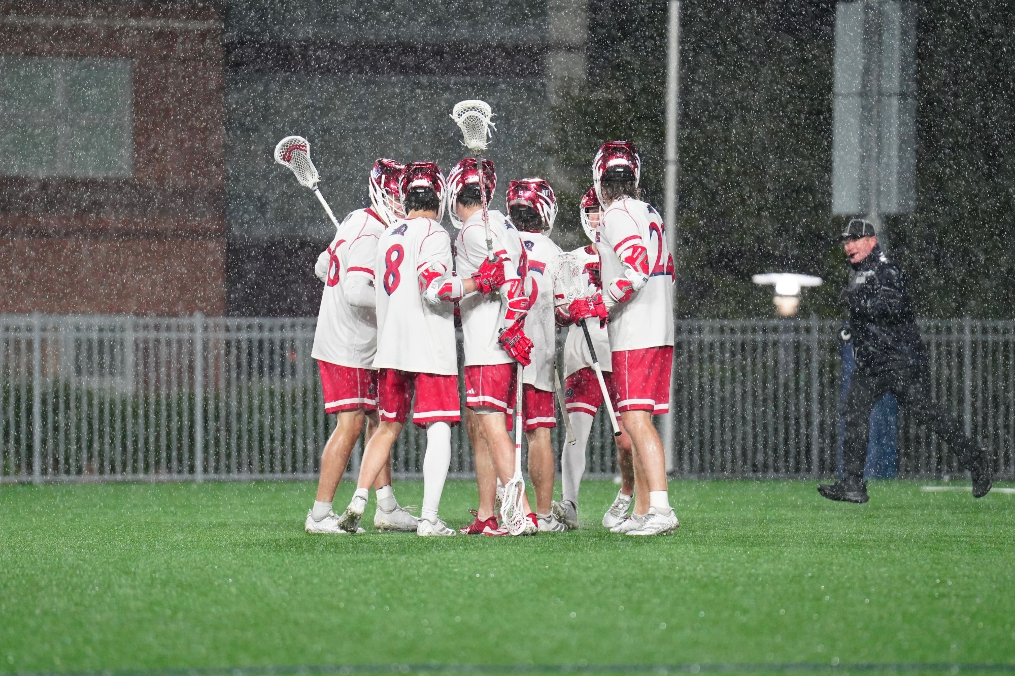 MLAX HUDDLE-Rain