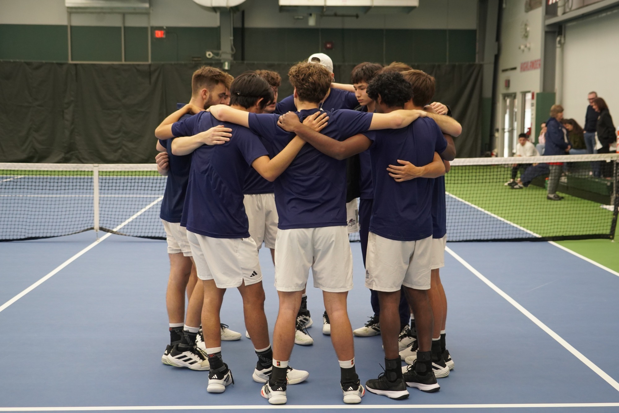 Mens Tennis Pregame huddle