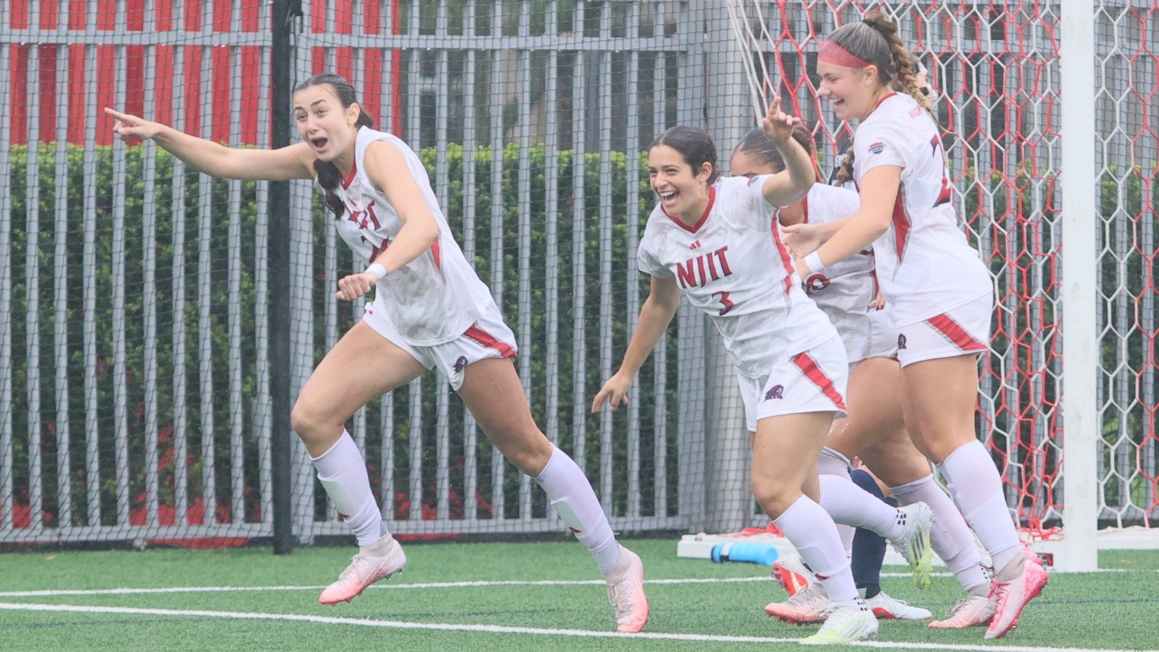 Alyssa Reiter celebrating first-career goal. 