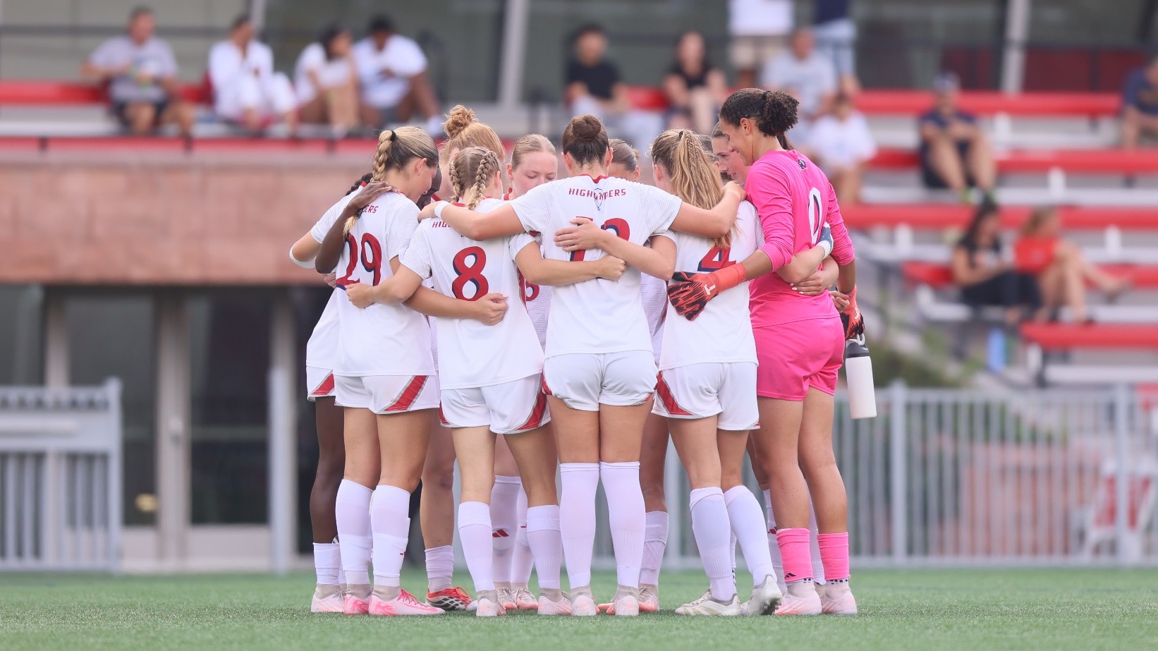 Women's Soccer Team Huddle
