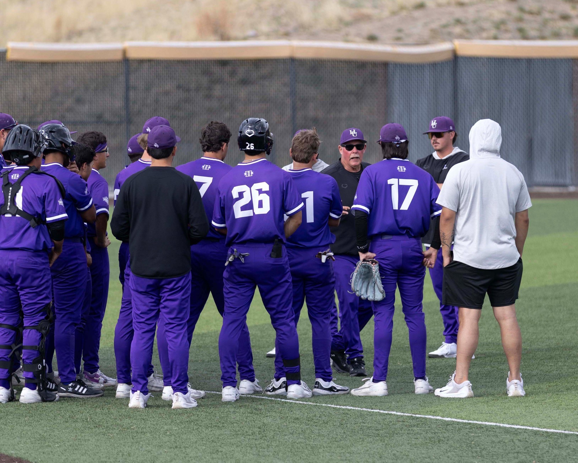Coach Jones talks to team
