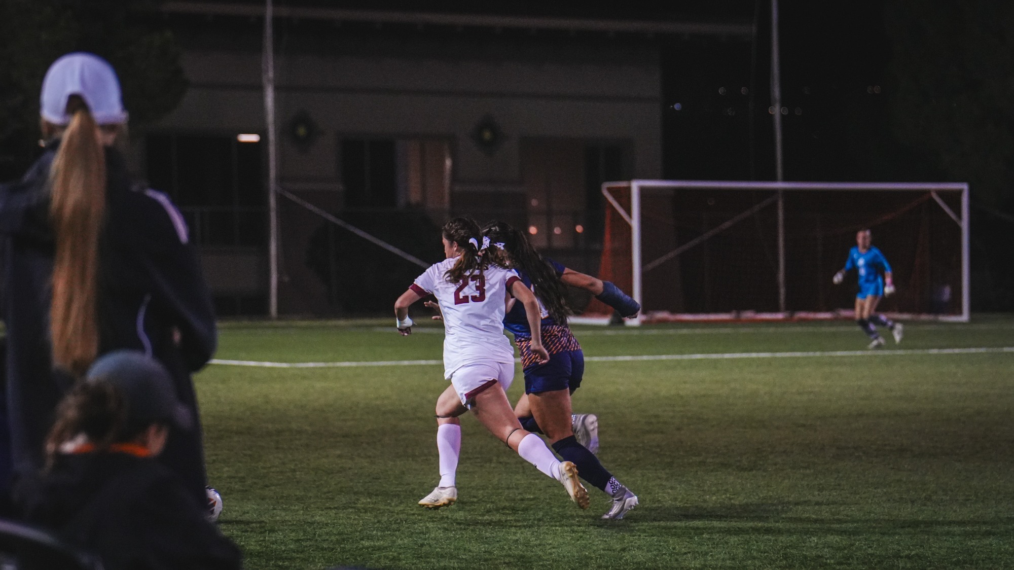 Meredith Scott battling for a ball down the sideline versus UTEP